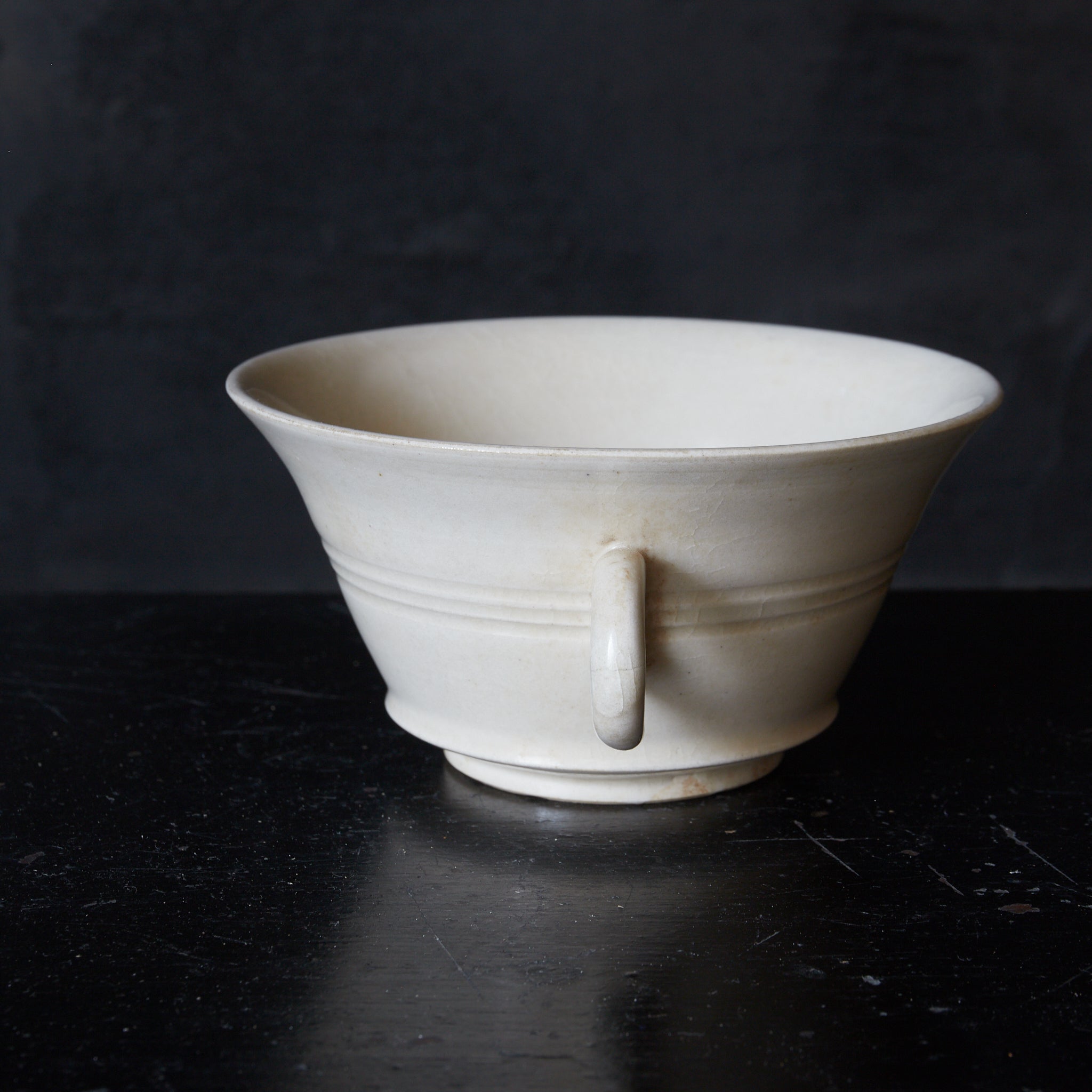 BOWL, Xingzhou kiln, white porcelain with single handle, Tang Dynasty(618-907CE)