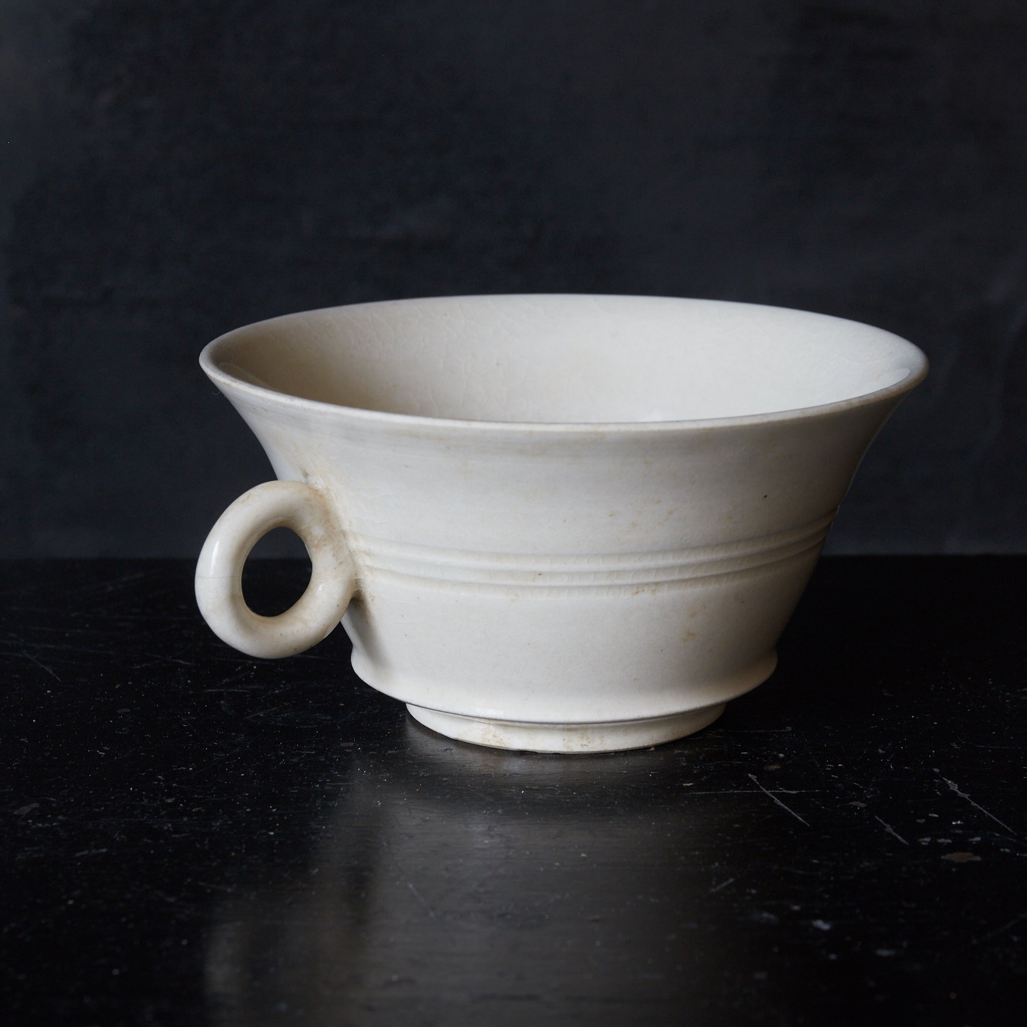 BOWL, Xingzhou kiln, white porcelain with single handle, Tang Dynasty(618-907CE)