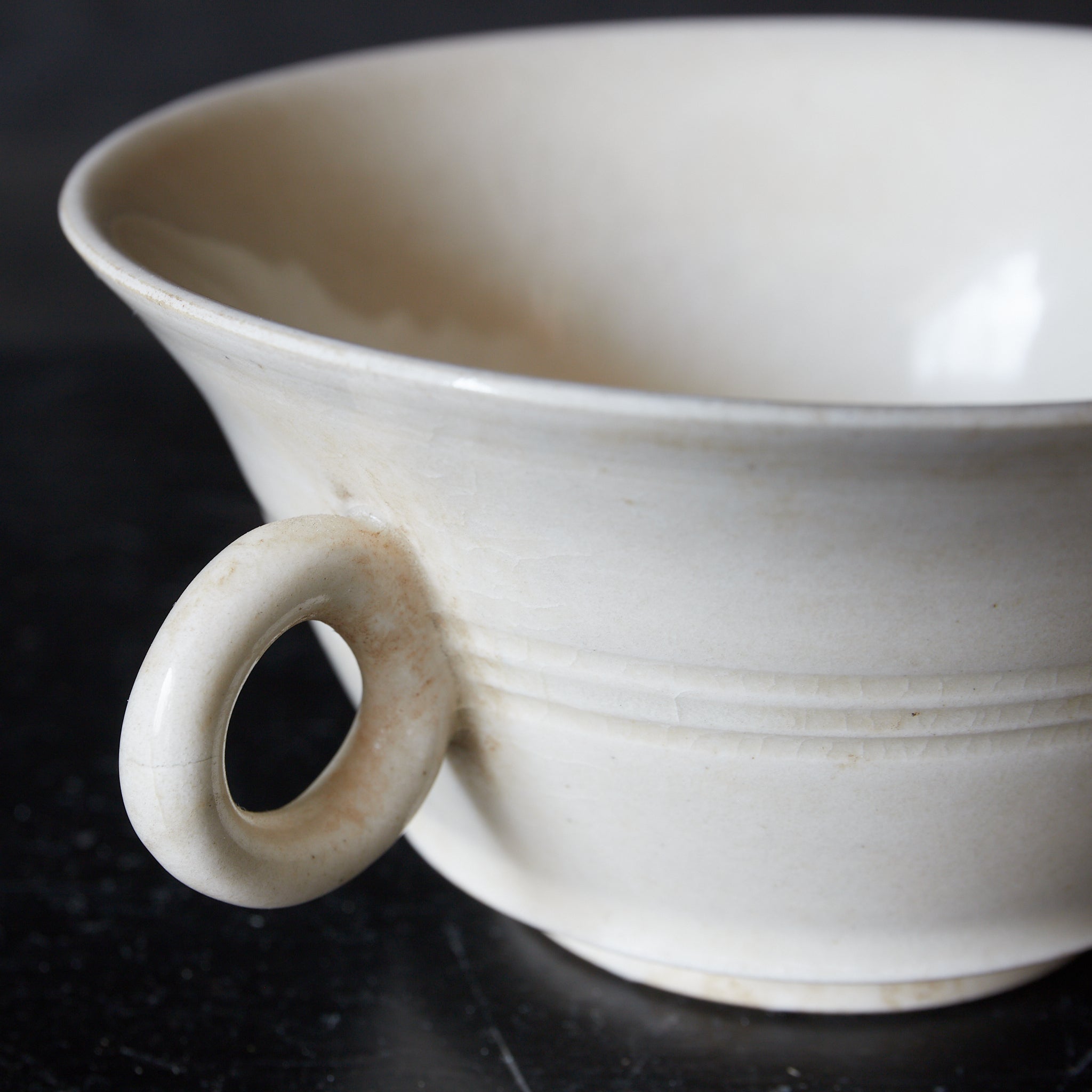 BOWL, Xingzhou kiln, white porcelain with single handle, Tang Dynasty(618-907CE)