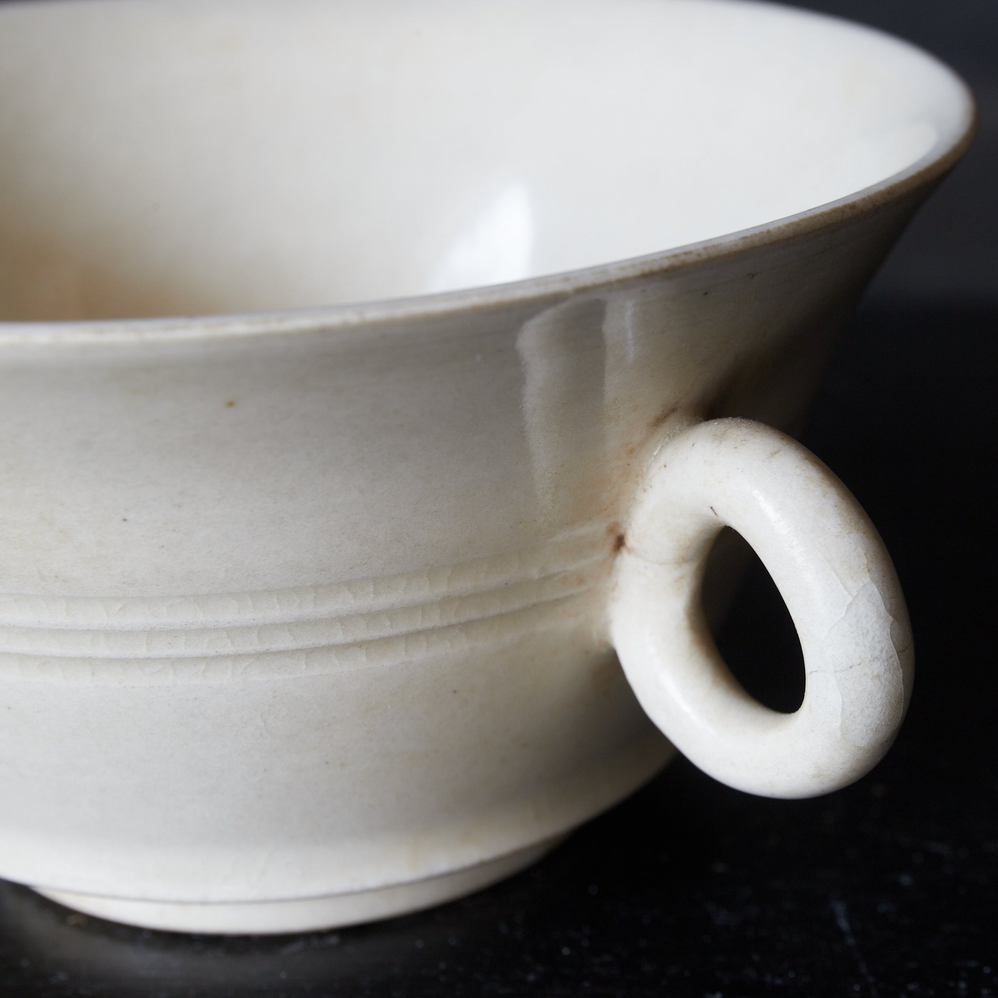 BOWL, Xingzhou kiln, white porcelain with single handle, Tang Dynasty(618-907CE)