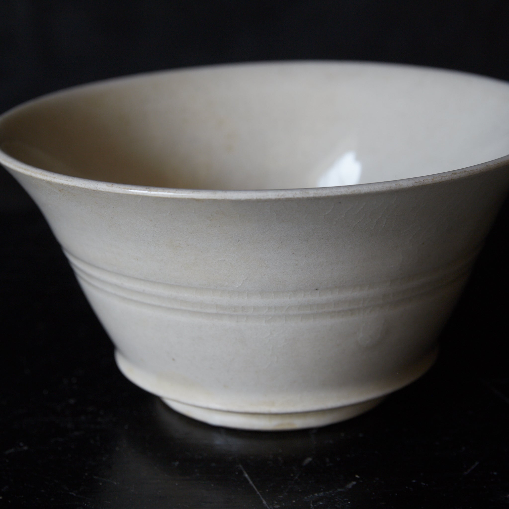 BOWL, Xingzhou kiln, white porcelain with single handle, Tang Dynasty(618-907CE)