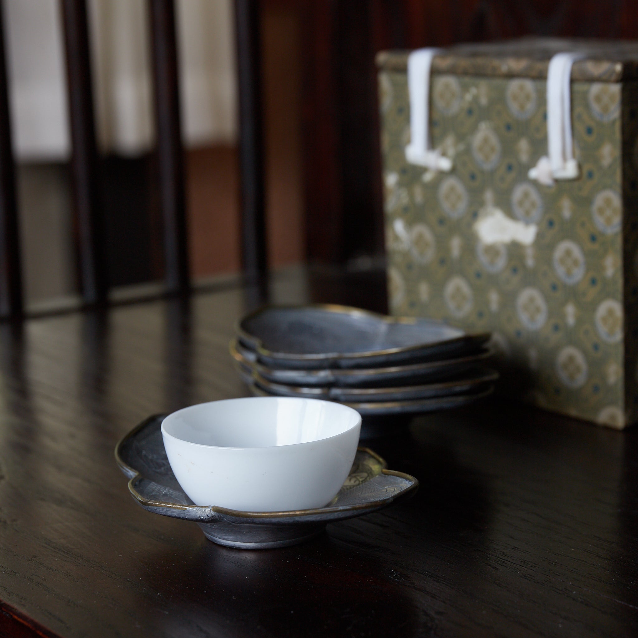 OLD LOBED-FLOWER-SHAPED TIN TEA SAUCER, marked Qianlong nian zhi, copper-covered, With box, set of 5, Qing Dynasty(1616–1911CE)