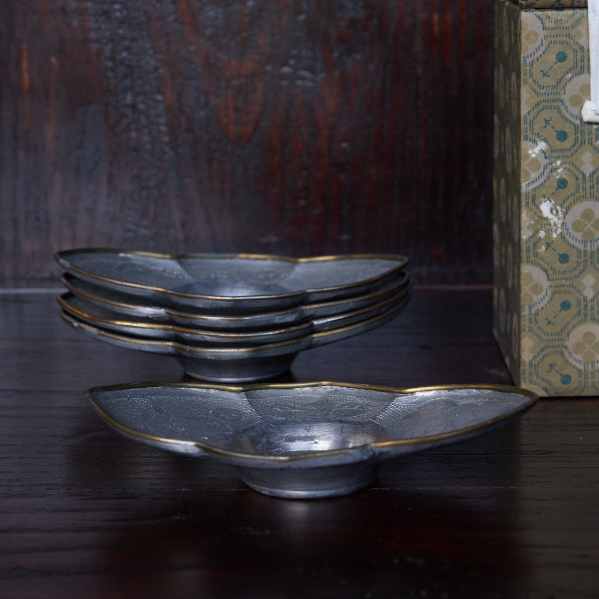 OLD LOBED-FLOWER-SHAPED TIN TEA SAUCER, marked Qianlong nian zhi, copper-covered, With box, set of 5, Qing Dynasty(1616–1911CE)