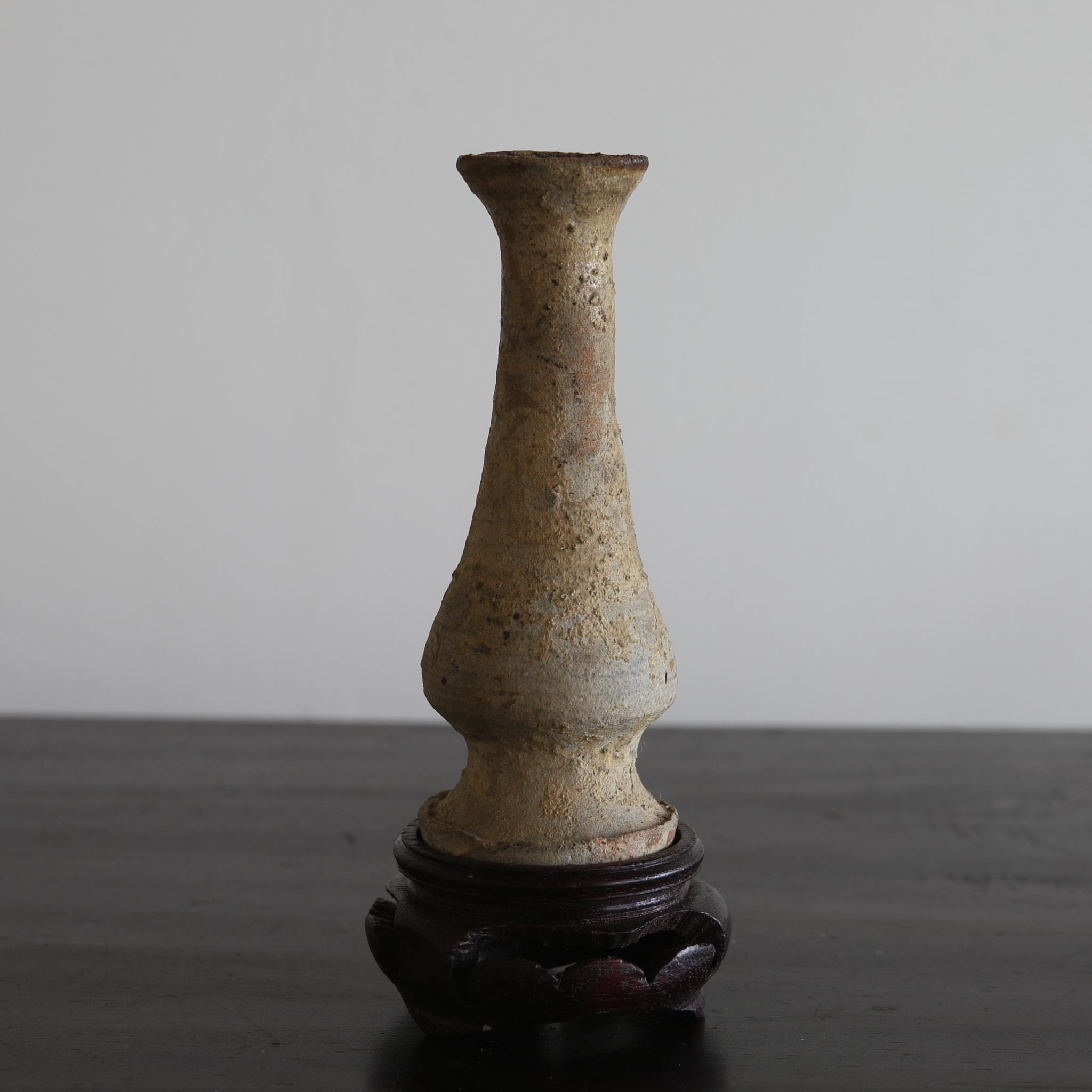 BUDDHIST ALTAR VASE, Ko-Seto, with a wooden stand, Kamakura Period(1185–1333CE)