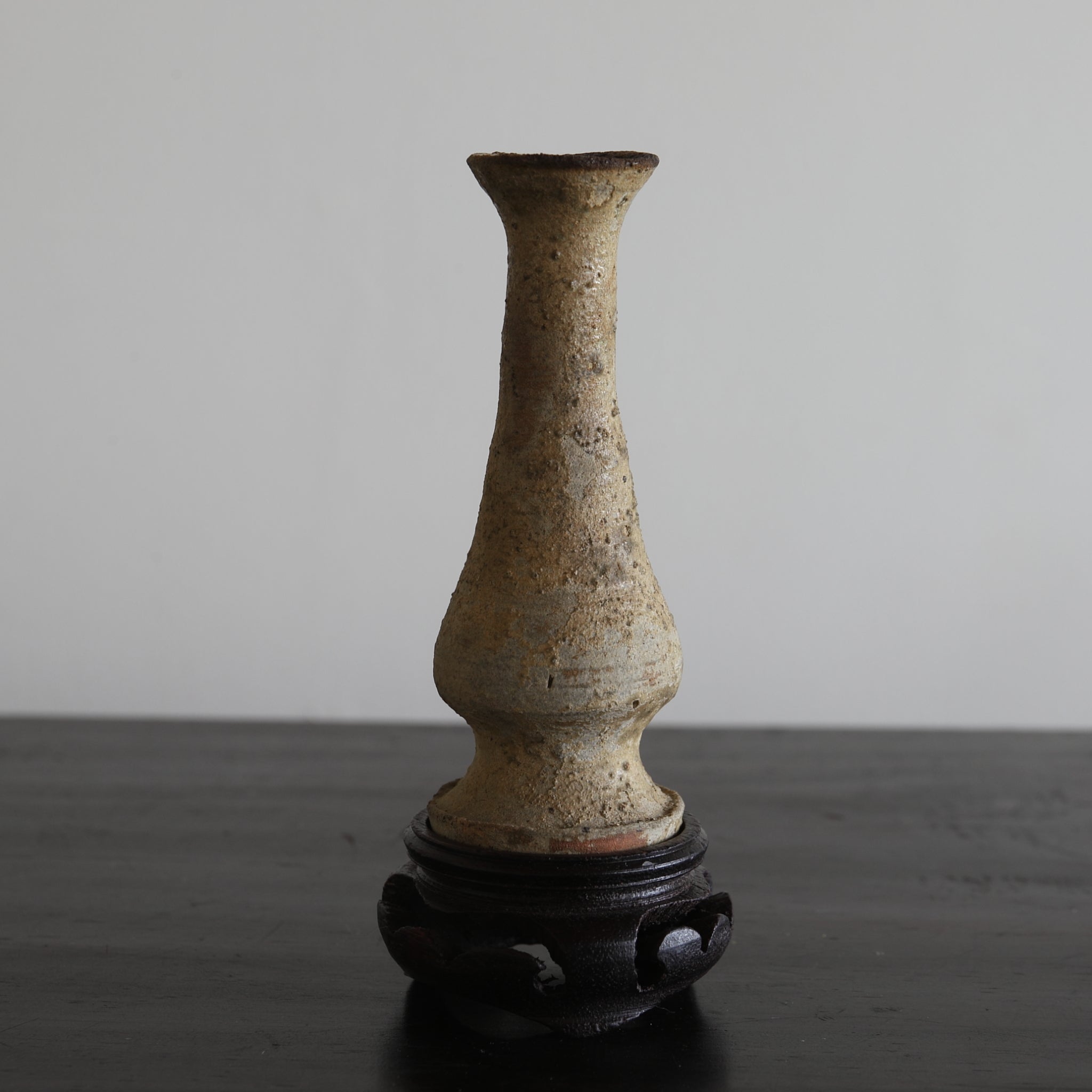 BUDDHIST ALTAR VASE, Ko-Seto, with a wooden stand, Kamakura Period(1185–1333CE)