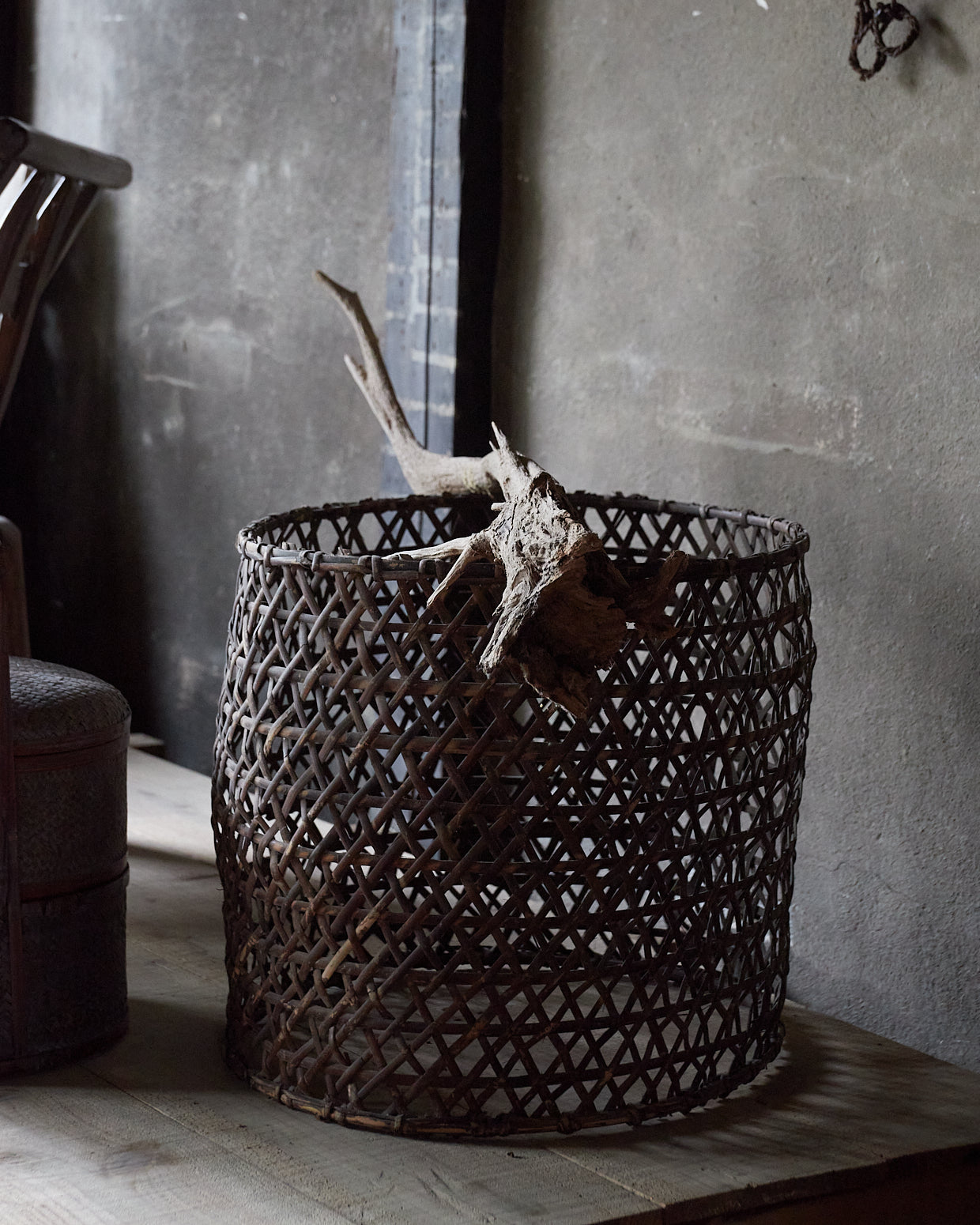 A well-used antique woven basket object from the Taisho period/1912-1926CE