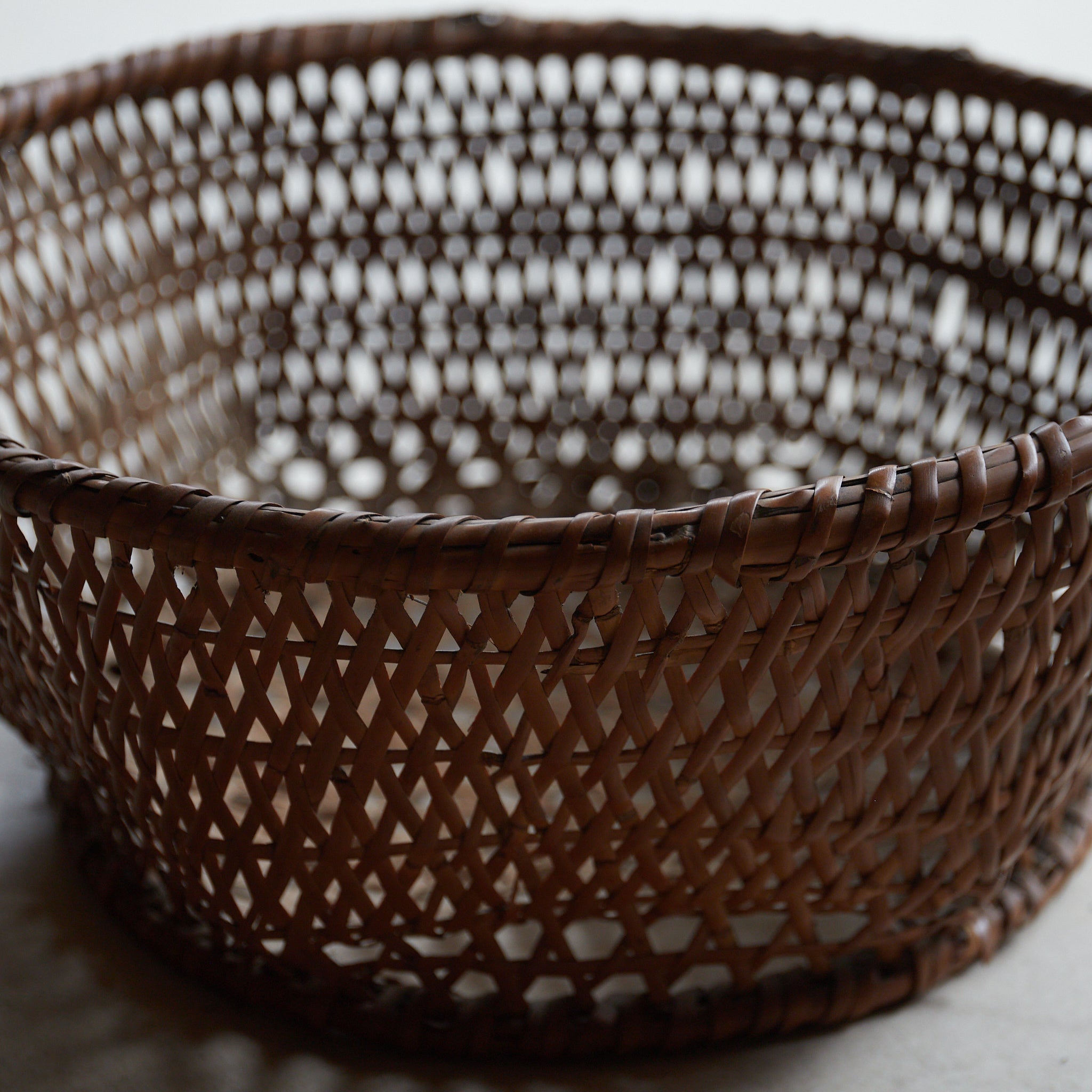 Amber-colored six-sided bamboo basket Taisho period/1912-1926CE