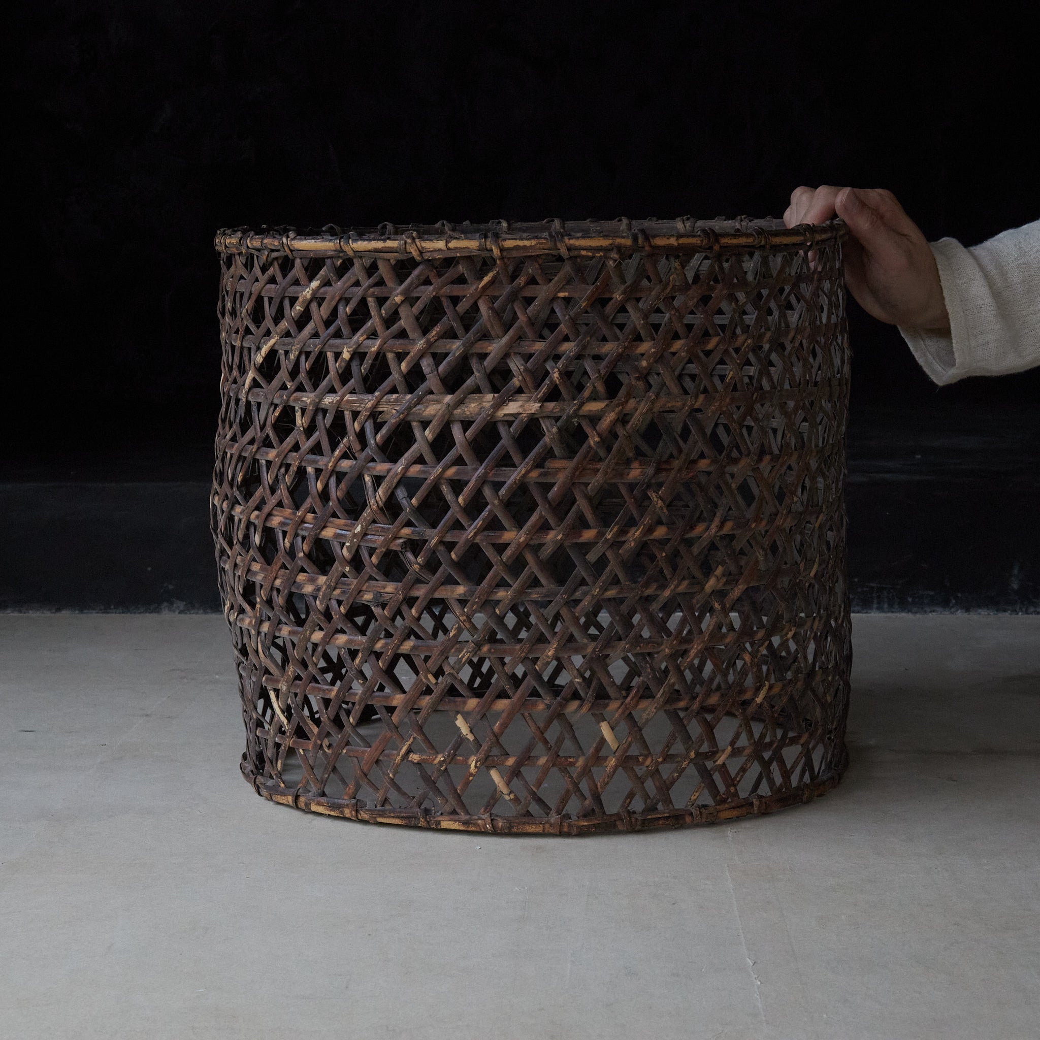 A well-used antique woven basket object from the Taisho period/1912-1926CE