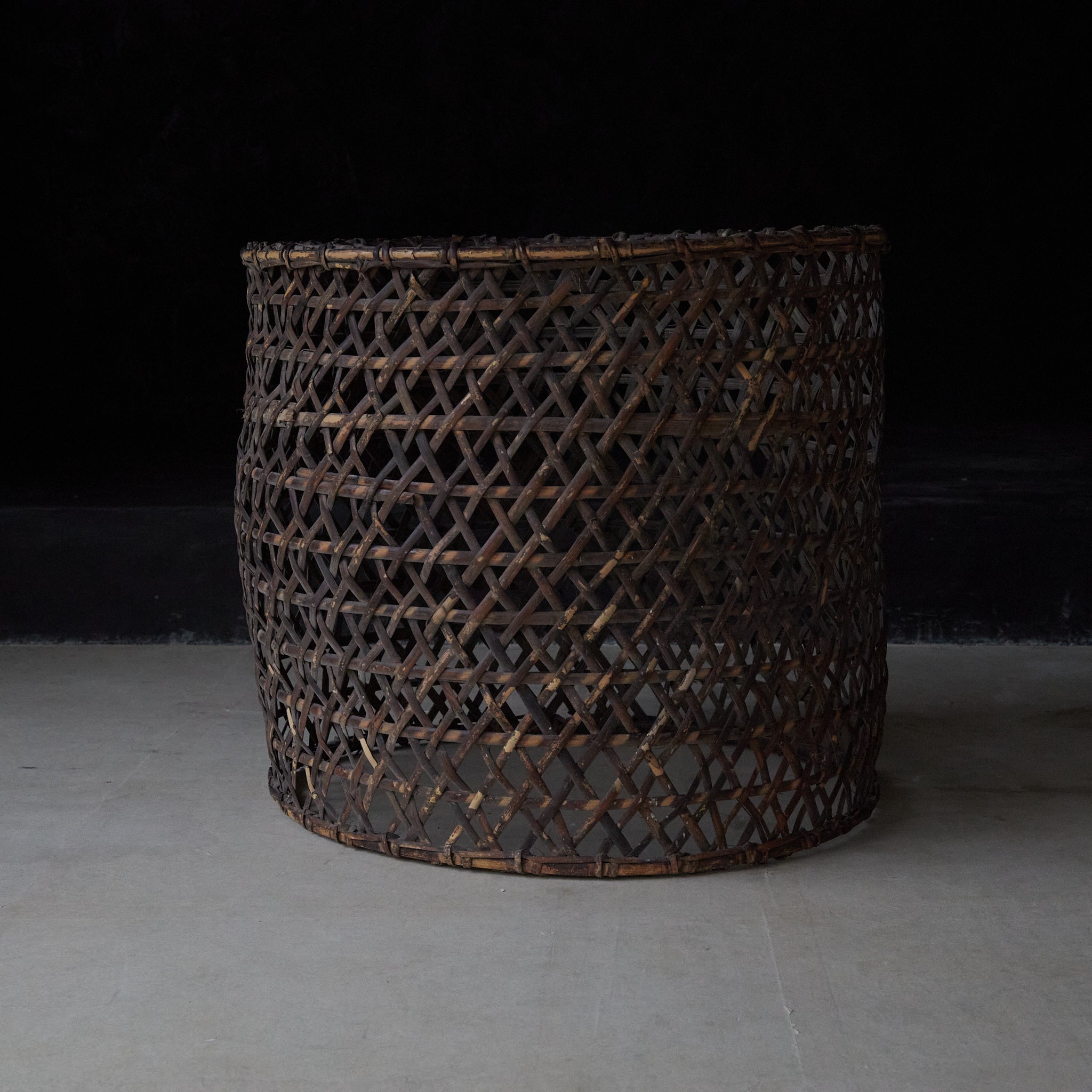 A well-used antique woven basket object from the Taisho period/1912-1926CE