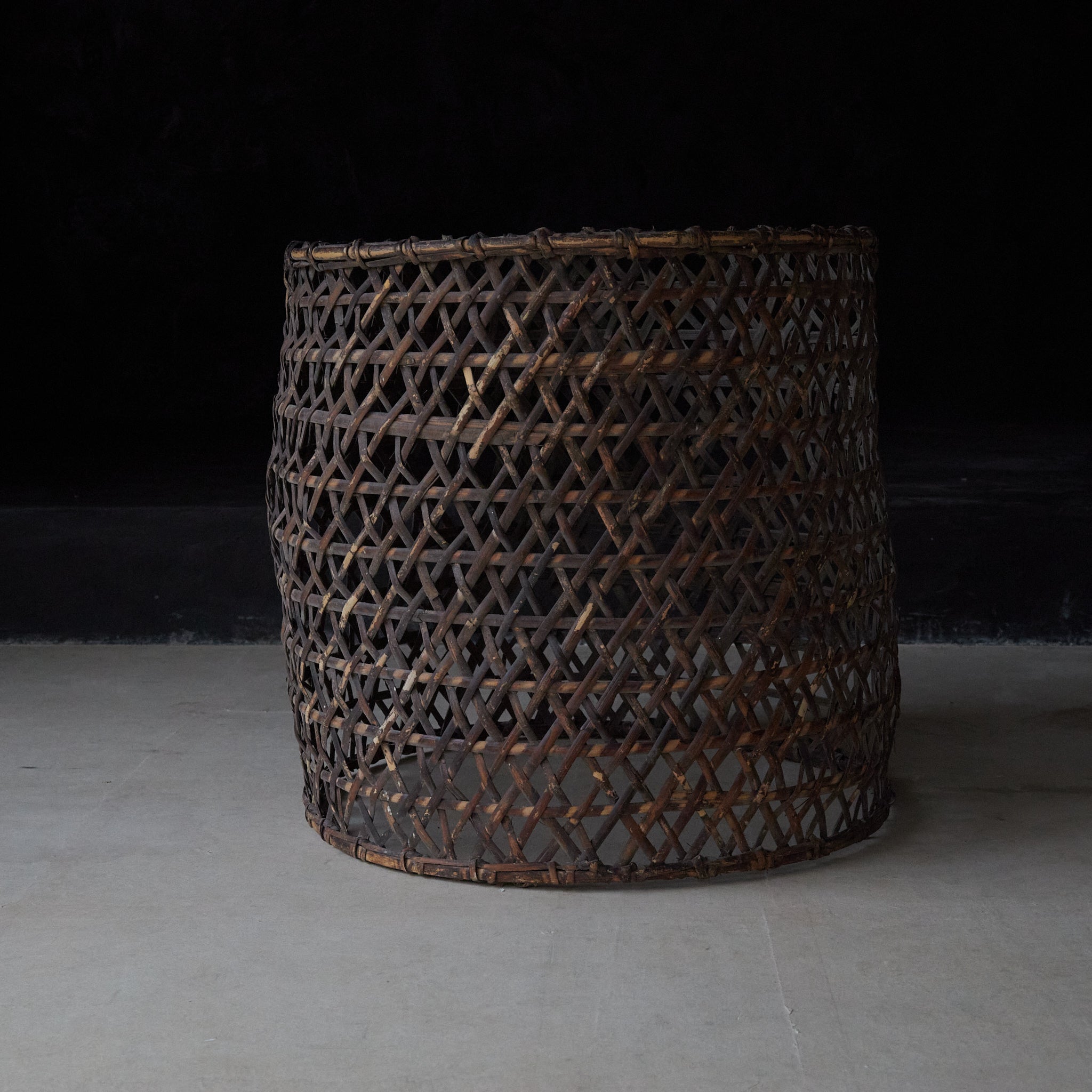 A well-used antique woven basket object from the Taisho period/1912-1926CE