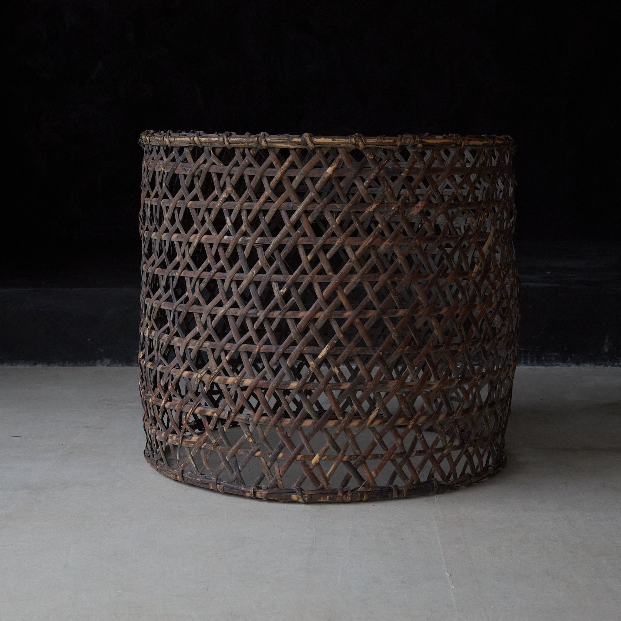 A well-used antique woven basket object from the Taisho period/1912-1926CE