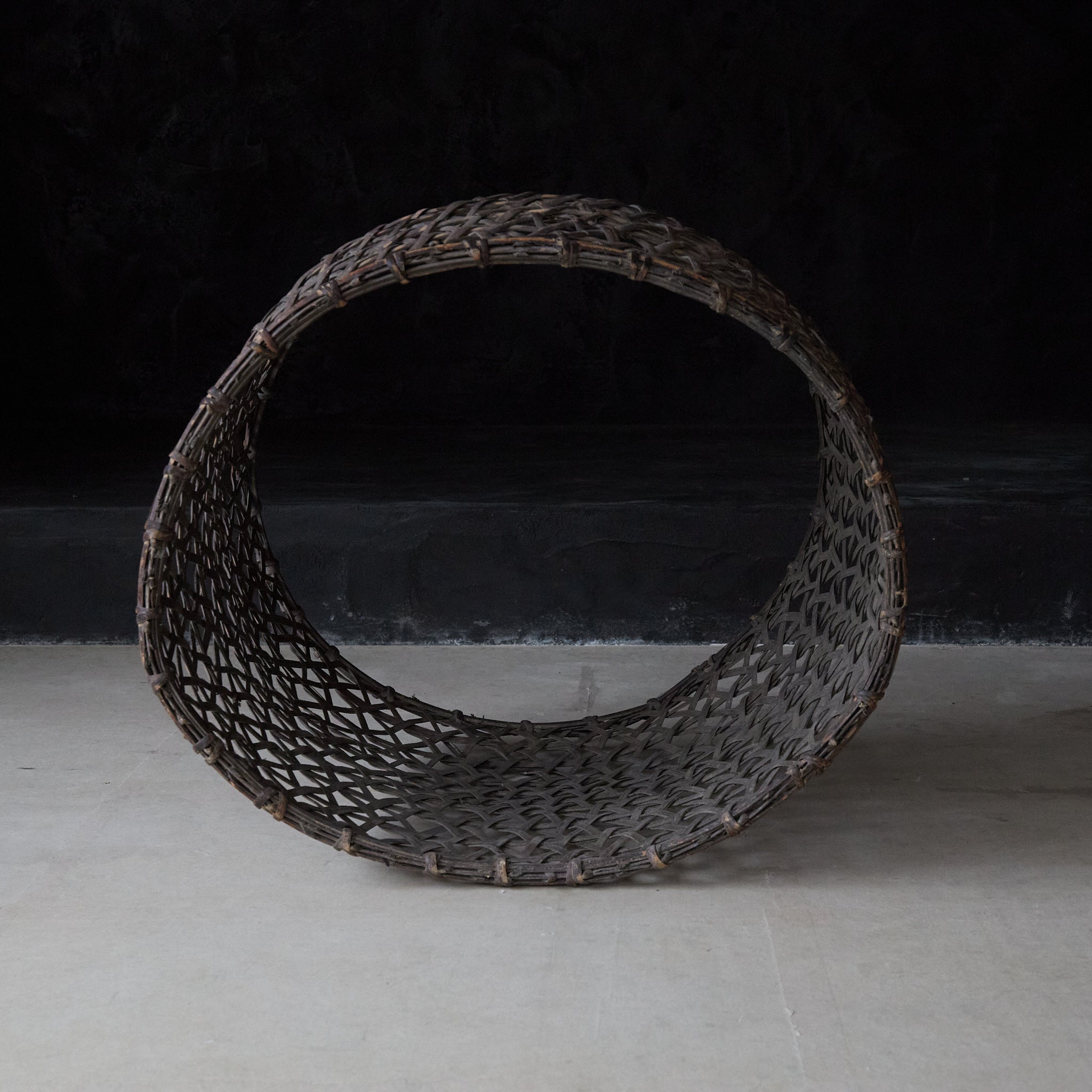 A well-used antique woven basket object from the Taisho period/1912-1926CE