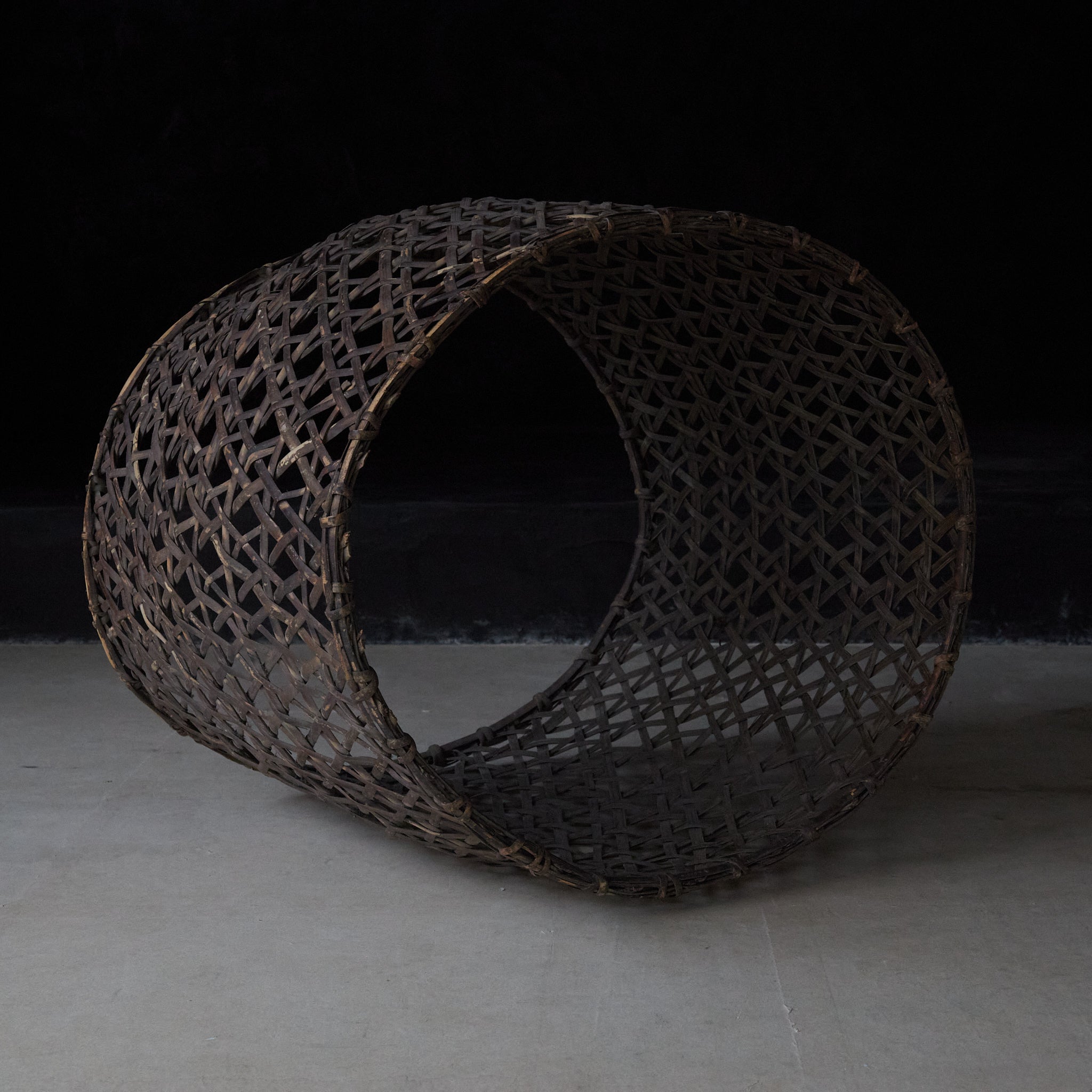 A well-used antique woven basket object from the Taisho period/1912-1926CE