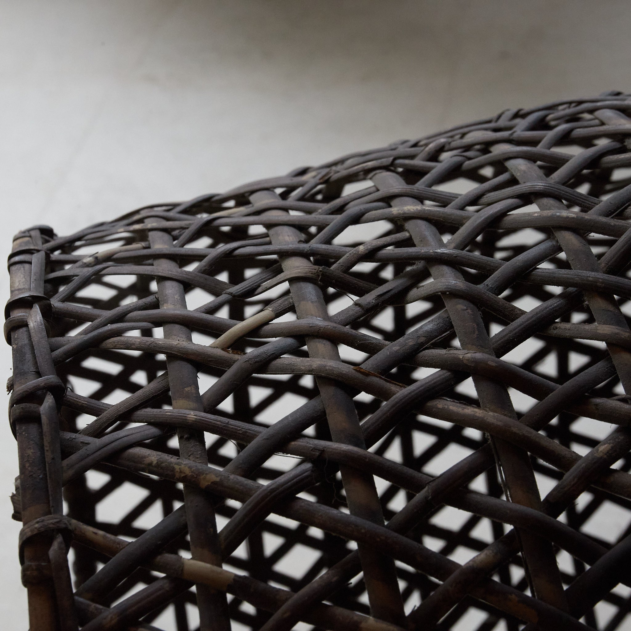 A well-used antique woven basket object from the Taisho period/1912-1926CE