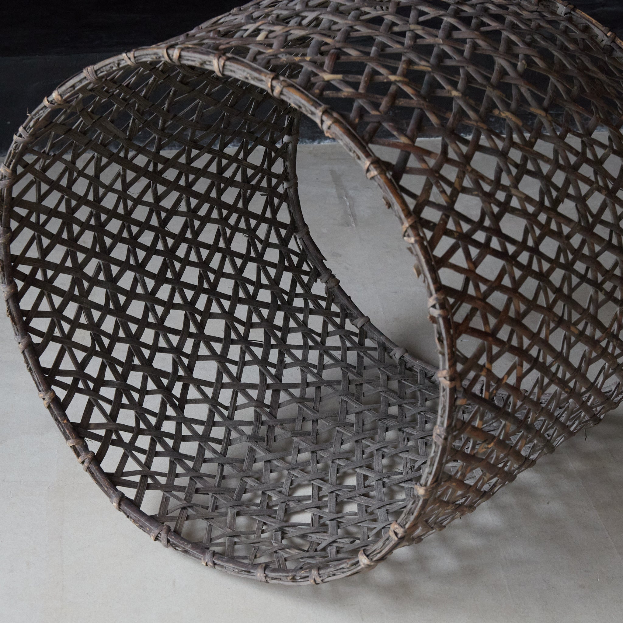 A well-used antique woven basket object from the Taisho period/1912-1926CE