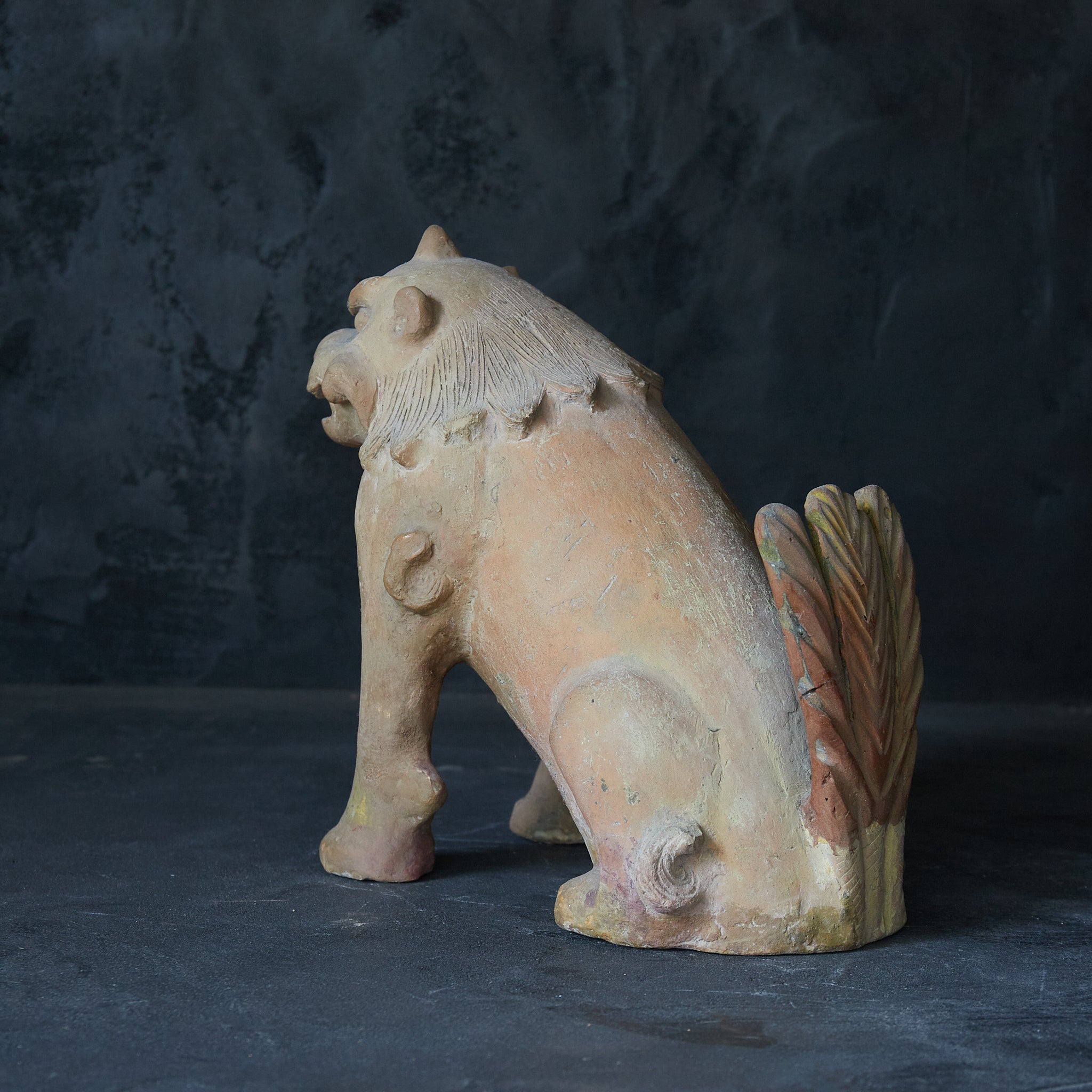 Earthenware lion statue