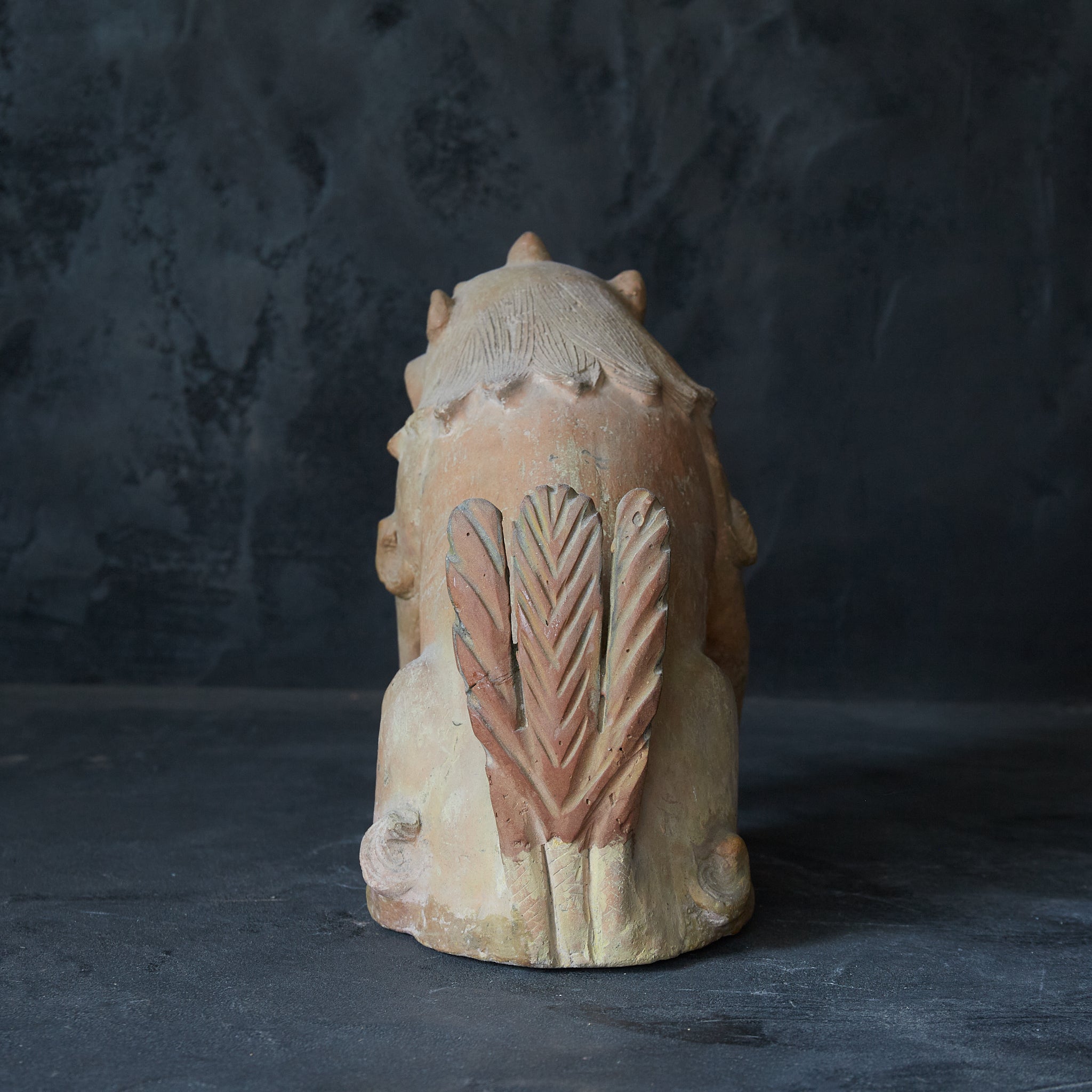 Earthenware lion statue