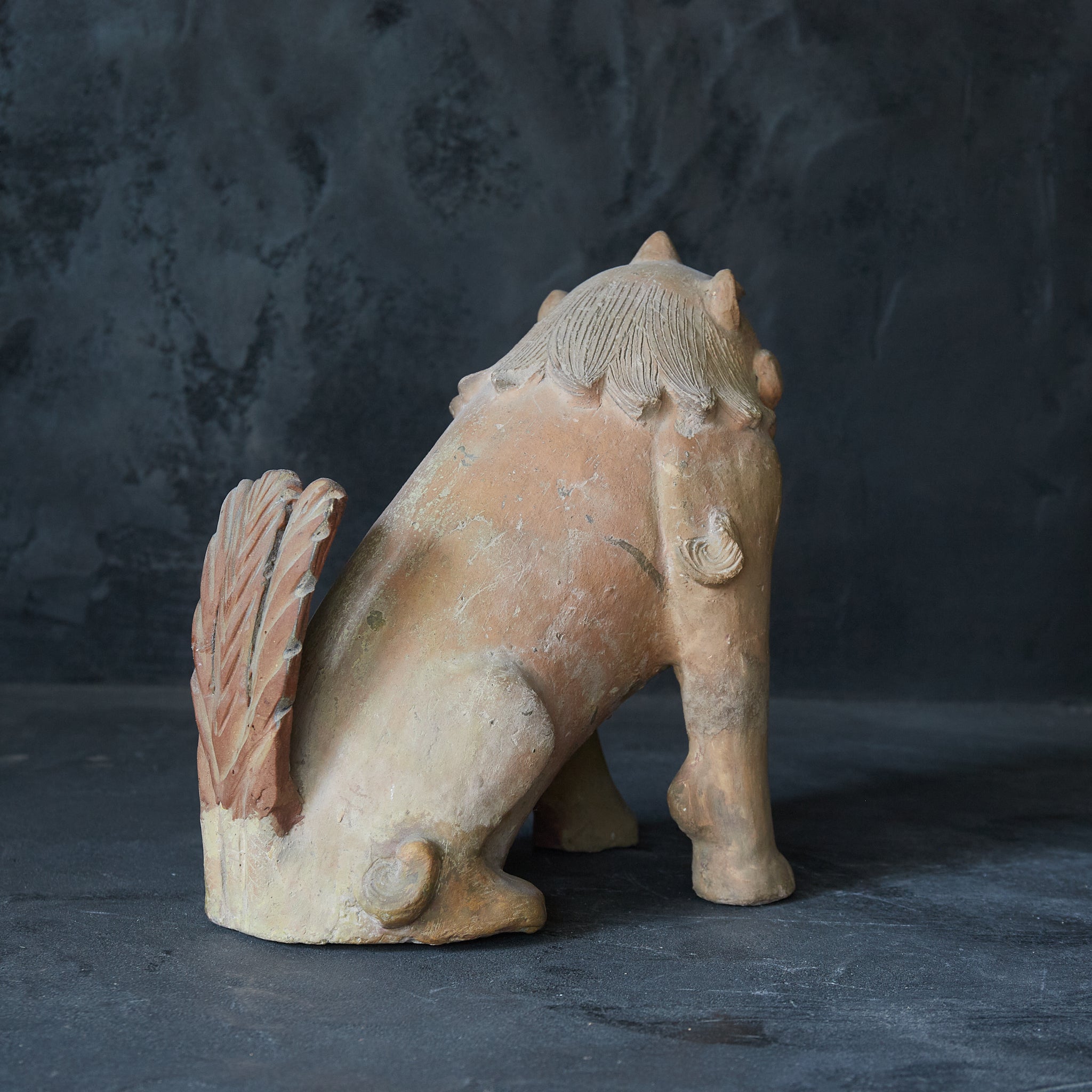 Earthenware lion statue