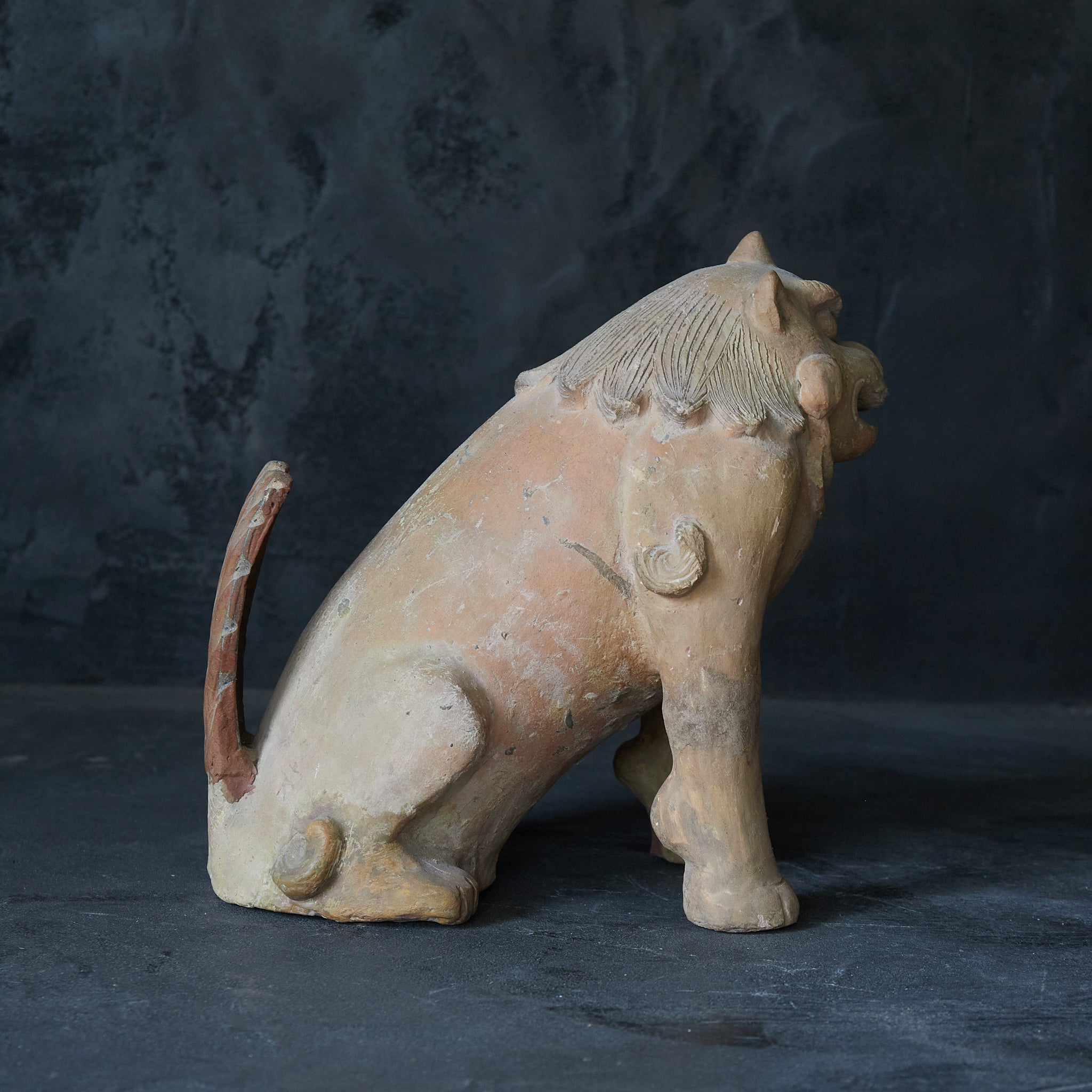 Earthenware lion statue