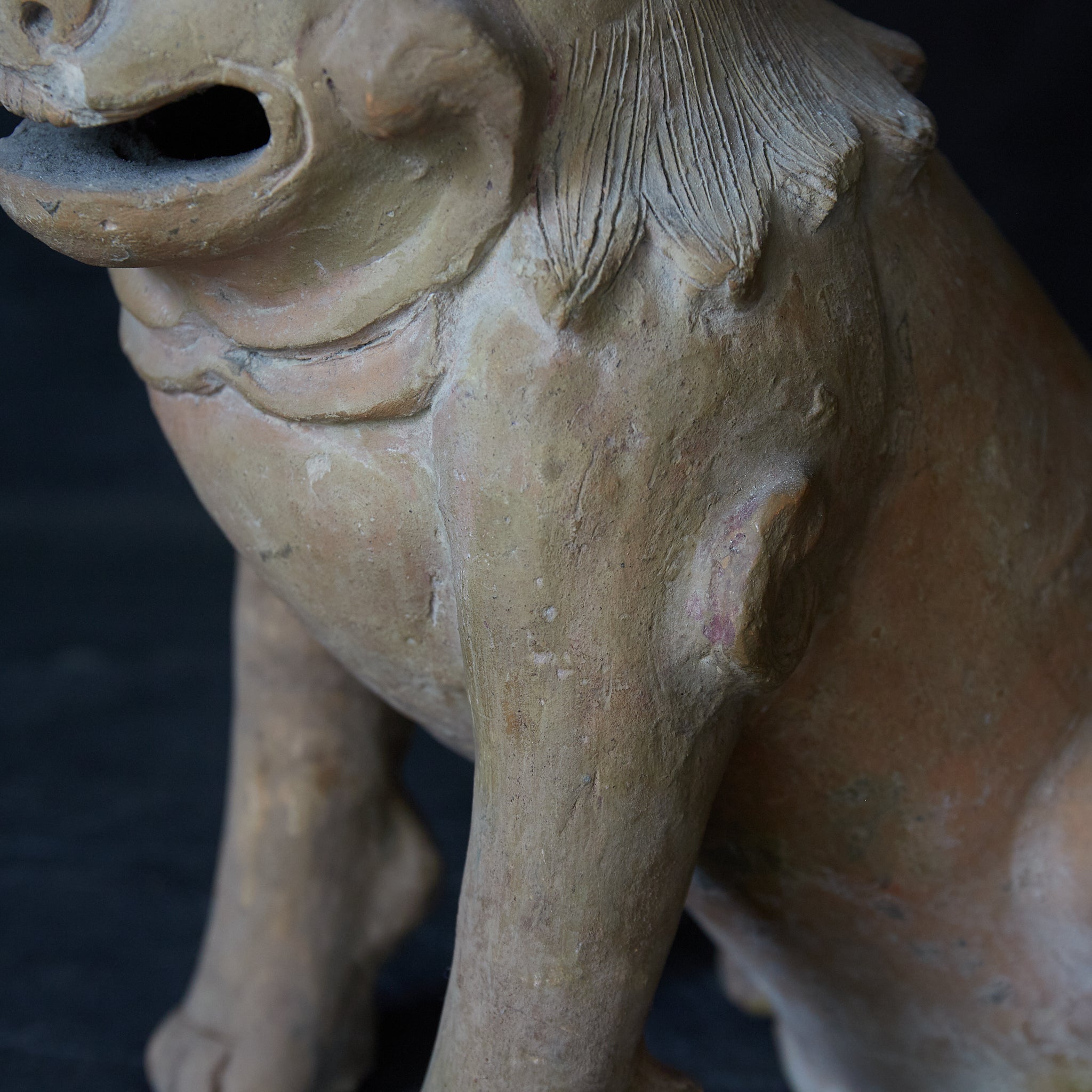 Earthenware lion statue