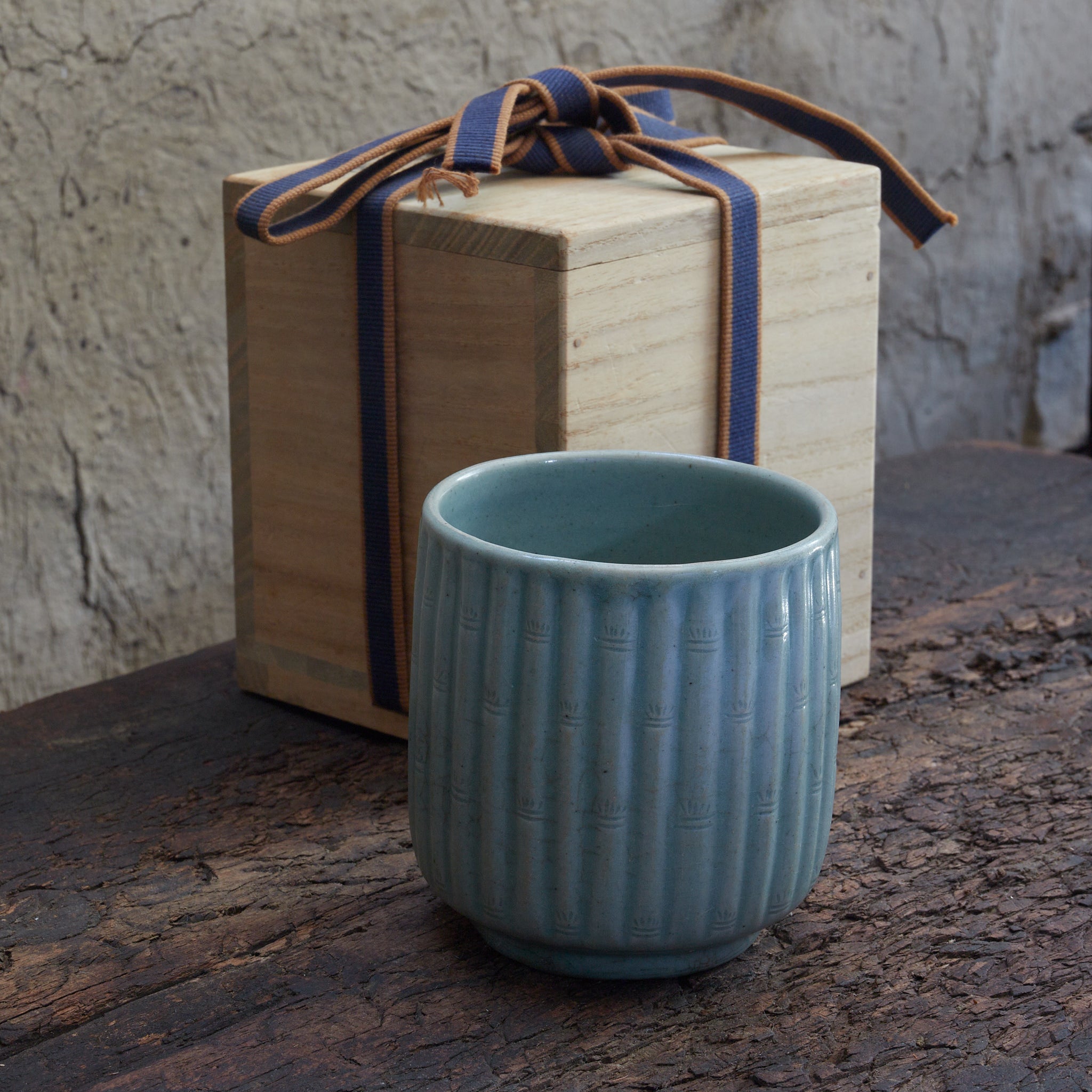 CYLINDRICAL CUP, Celadon with relief-carved bamboo-joint pattern, With wooden box, Goryeo Dynasty (918–1392 CE)