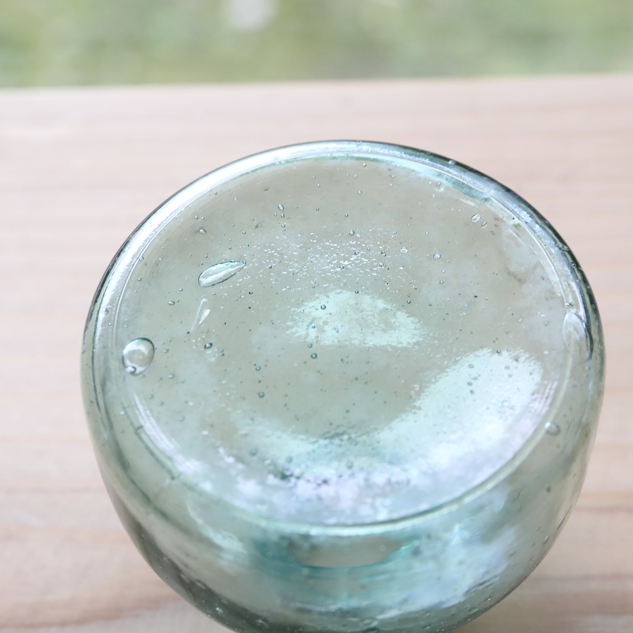 Antique Small Glass Bottle with Air Bubbles (Green), Taisho Period (1912-1926 CE)