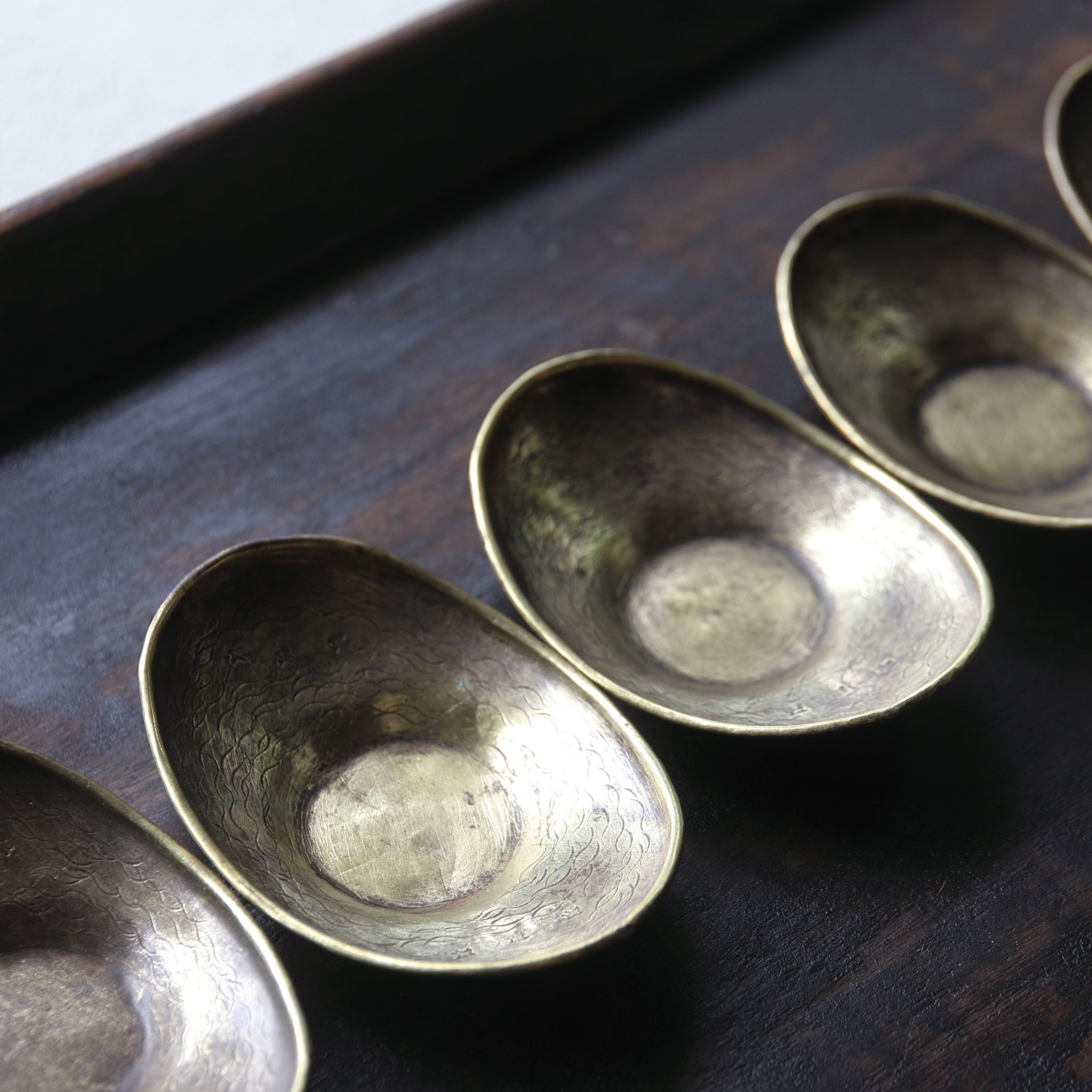 Old copper oval tea bowl with houndstooth engravings, Taisho period/1912-1926CE