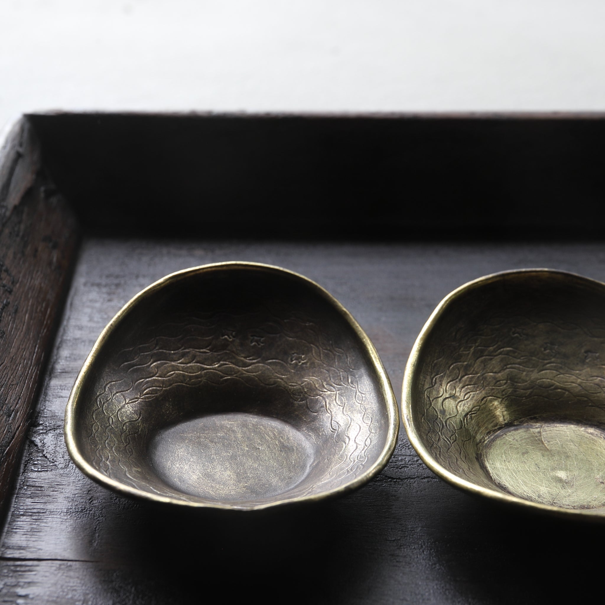 Old copper oval tea bowl with houndstooth engravings, Taisho period/1912-1926CE