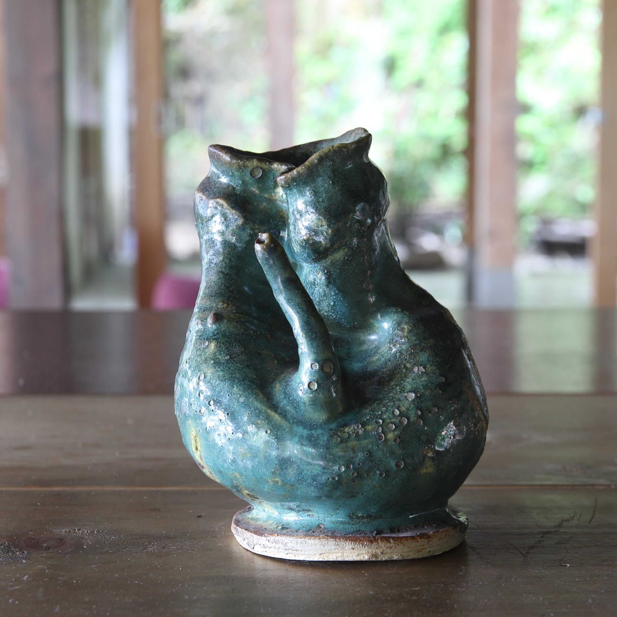 Green glaze water jug, details unknown