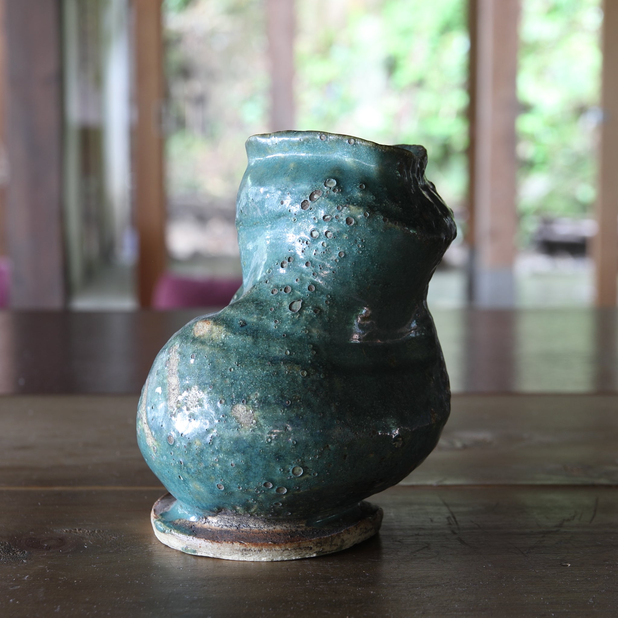 Green glaze water jug, details unknown