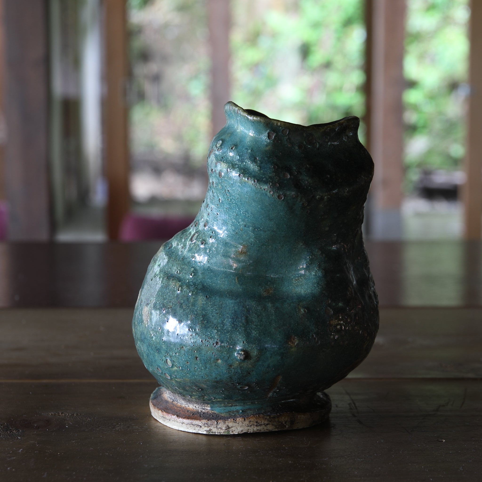 Green glaze water jug, details unknown