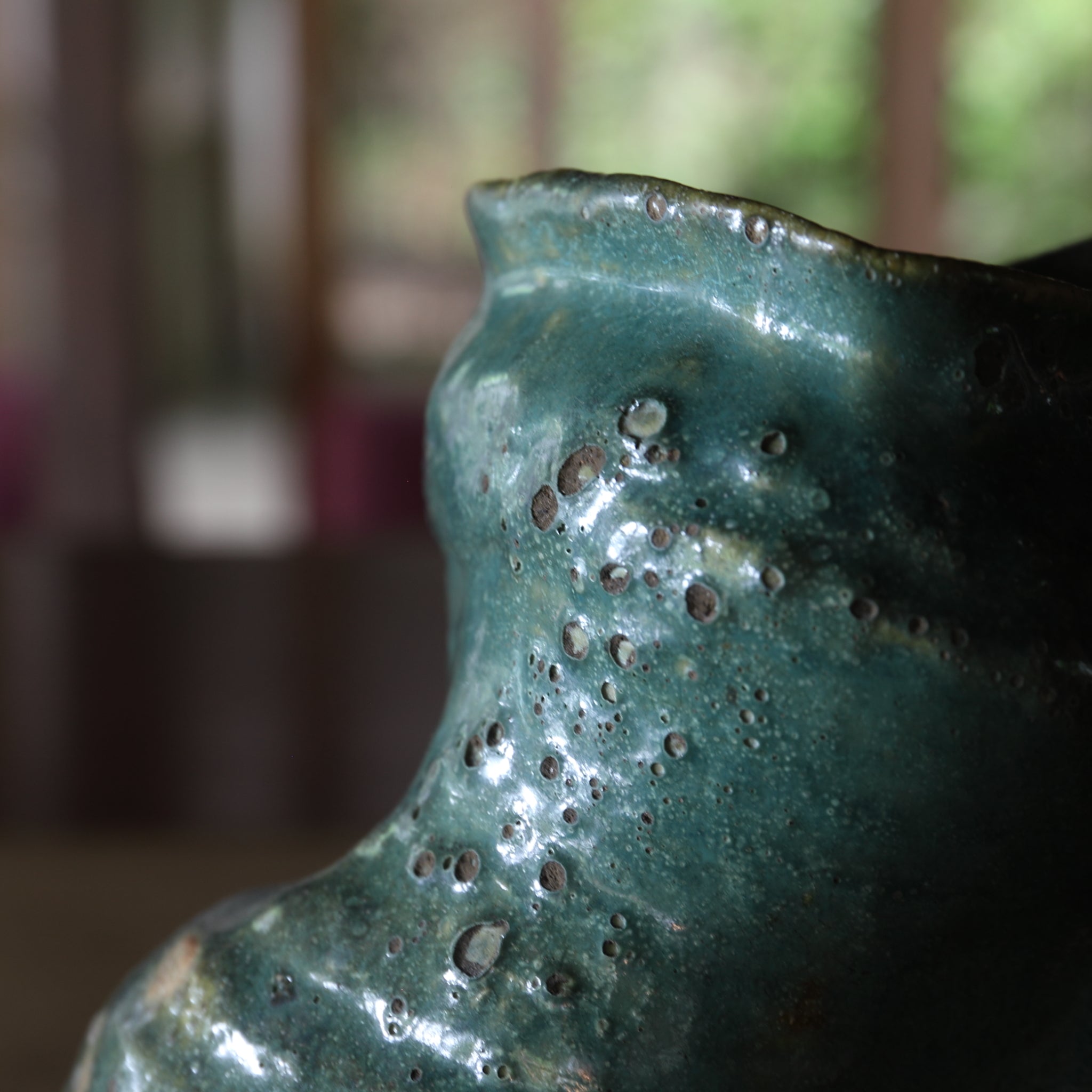 Green glaze water jug, details unknown