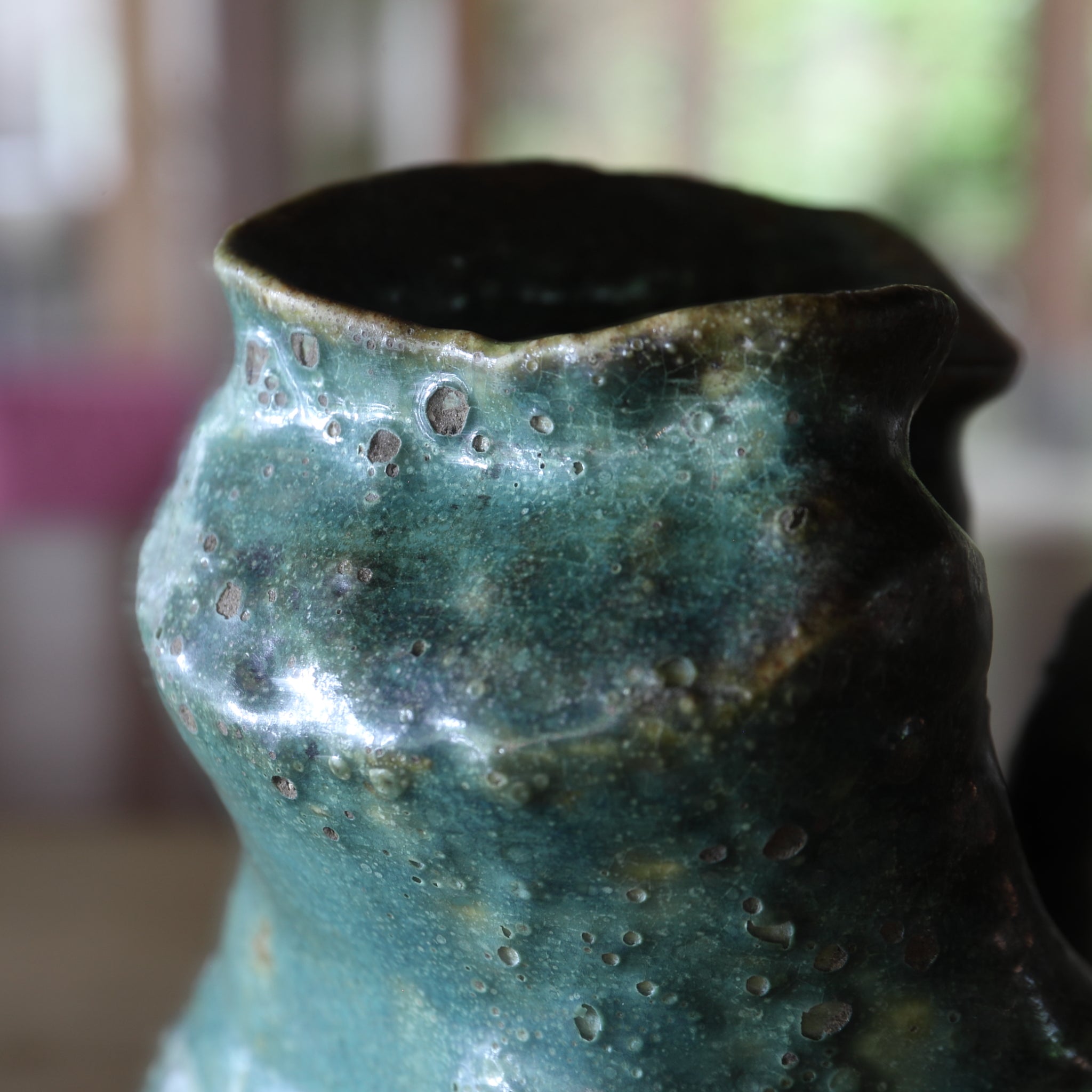 Green glaze water jug, details unknown