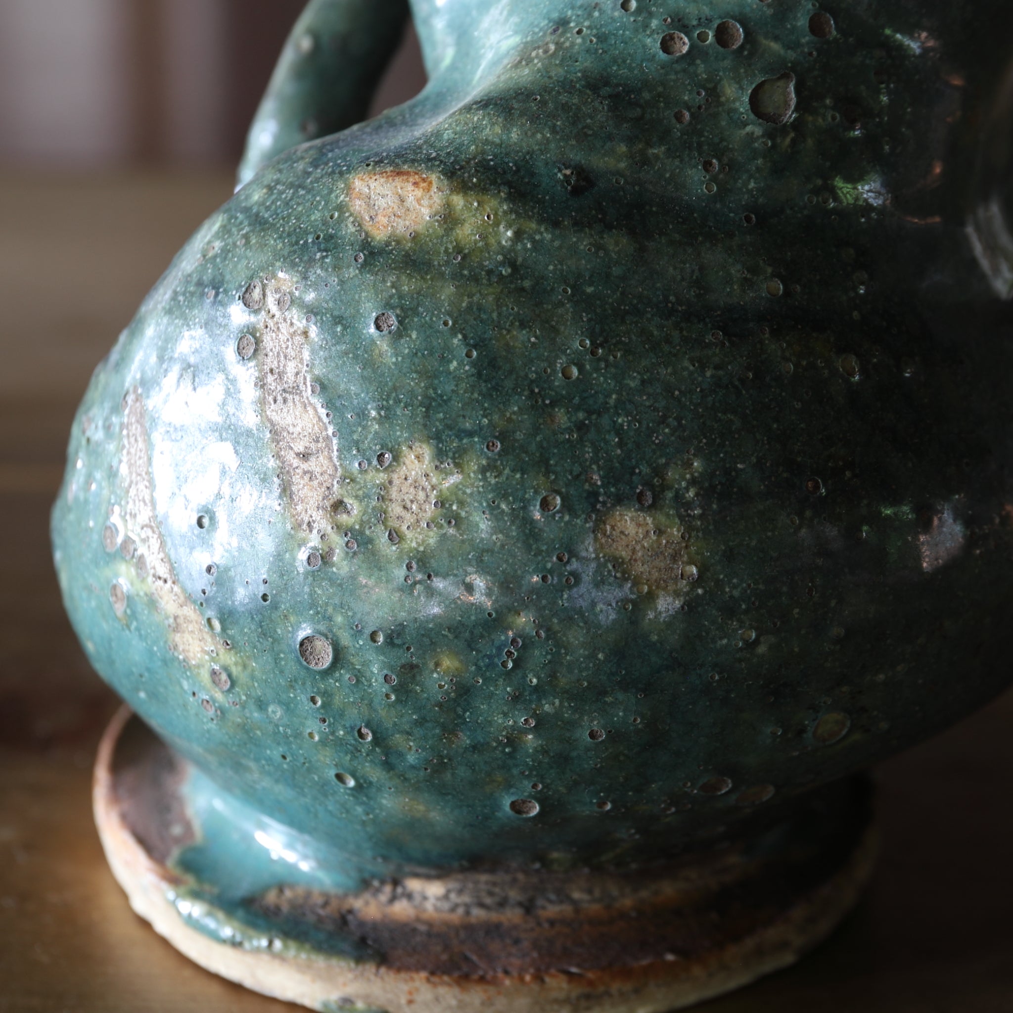 Green glaze water jug, details unknown