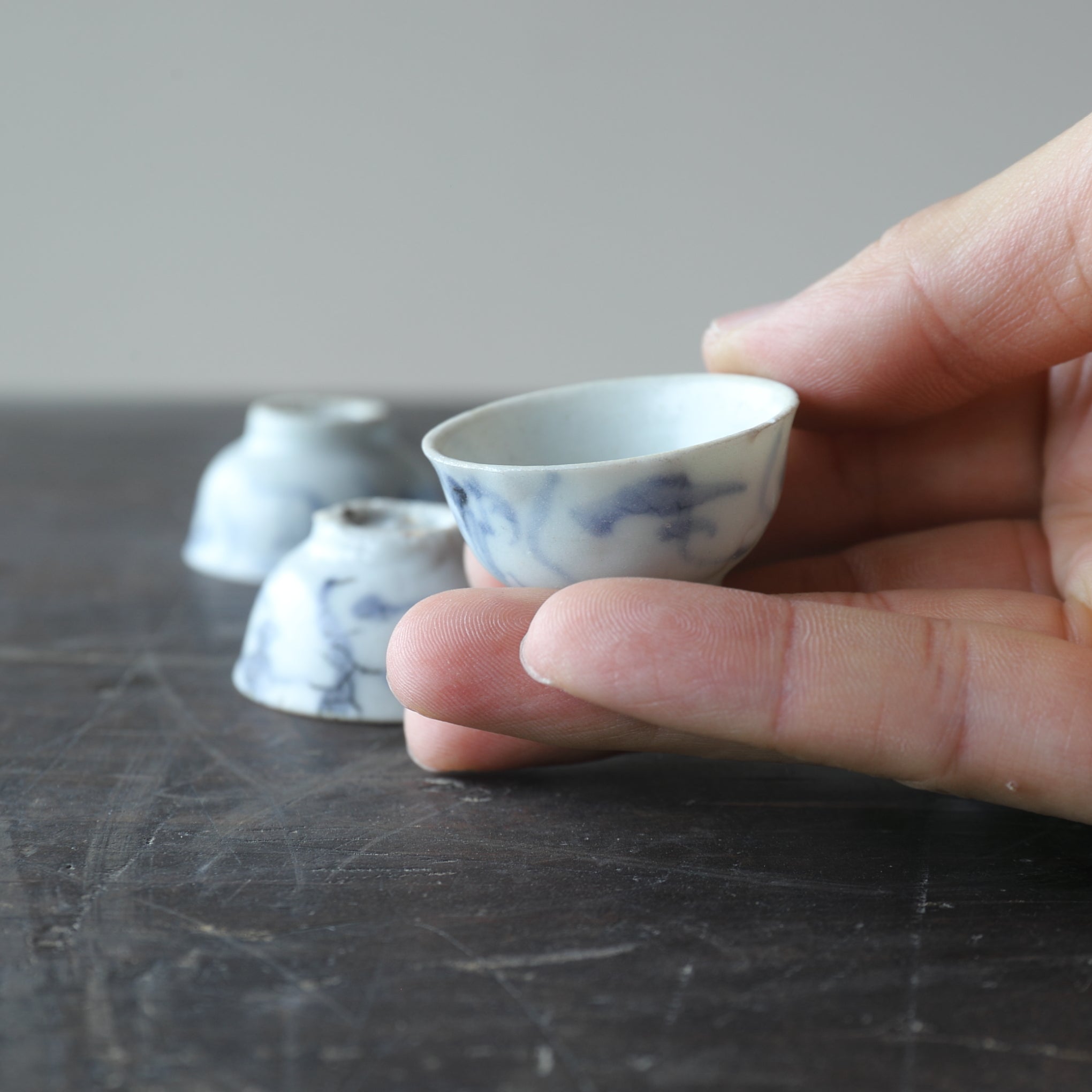 Set of 10 Ming Dynasty Blue and White Grass Pattern Tea Cups (1368-1644CE)