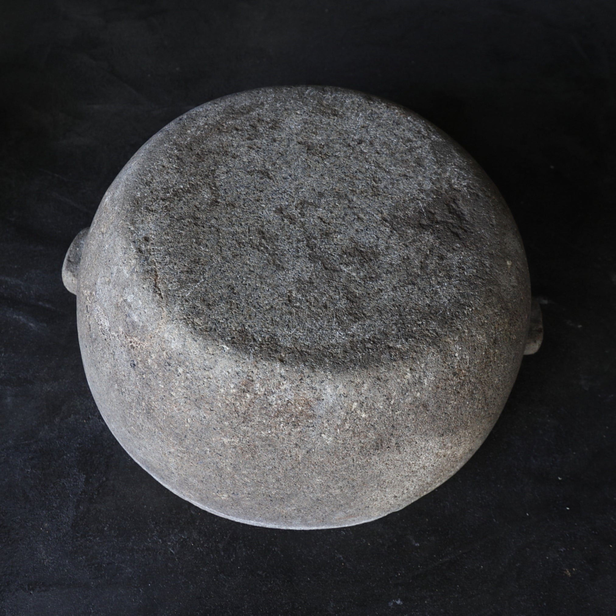 Old stone mortar with handle