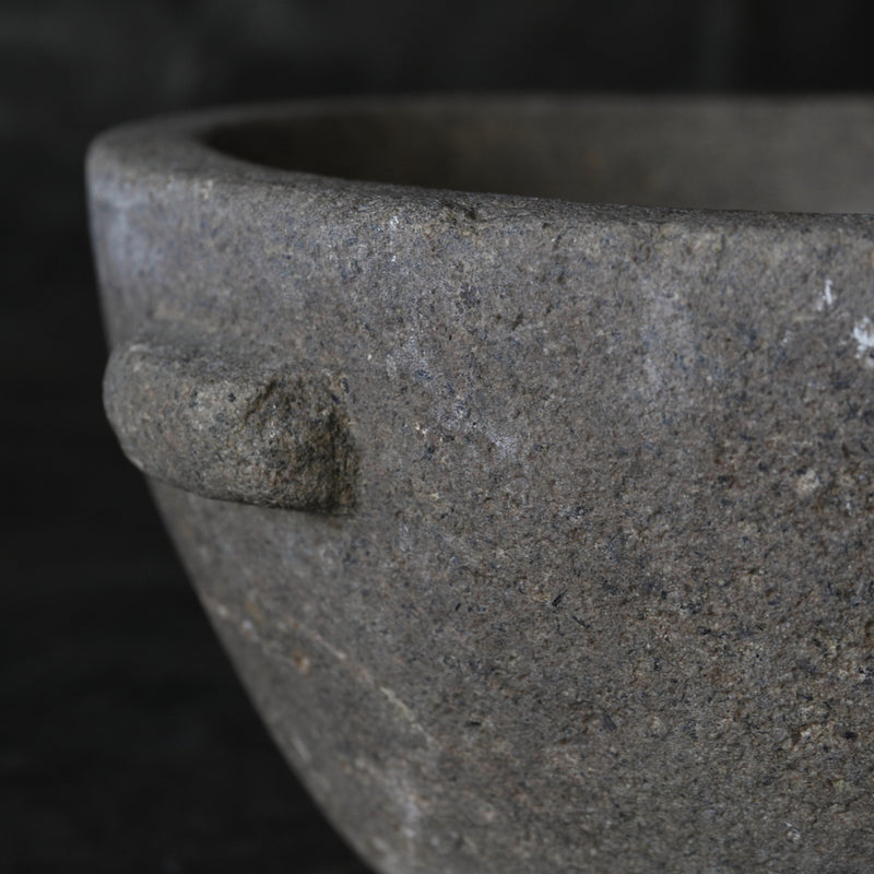 Old stone mortar with handle