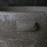 Old stone mortar with handle
