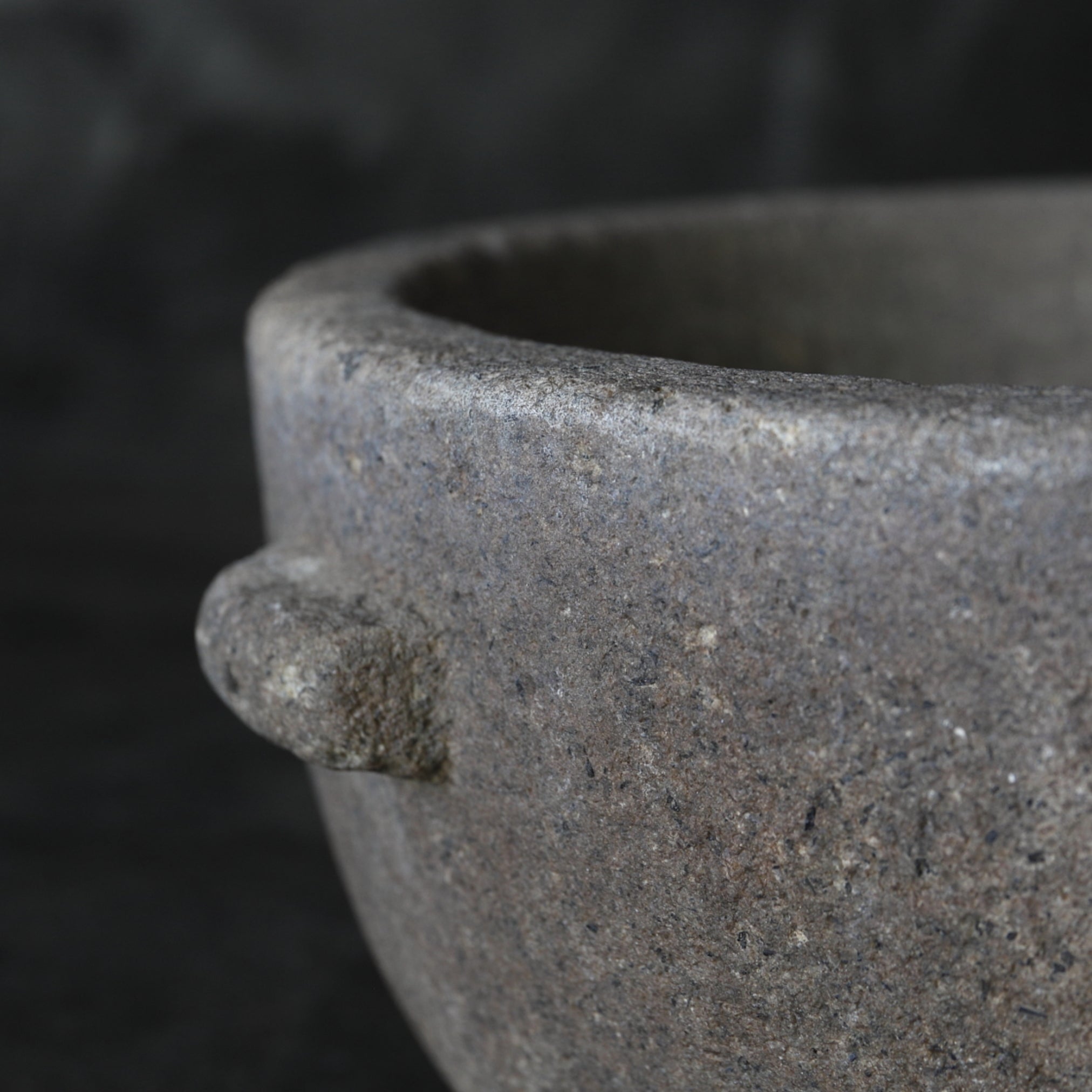 Old stone mortar with handle