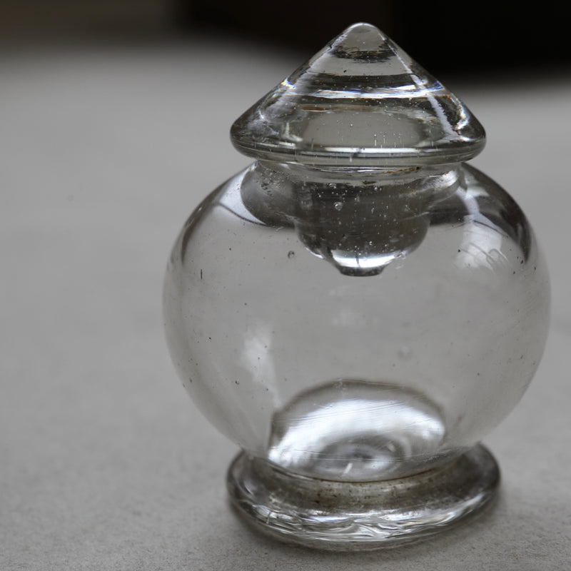 old glass tea container