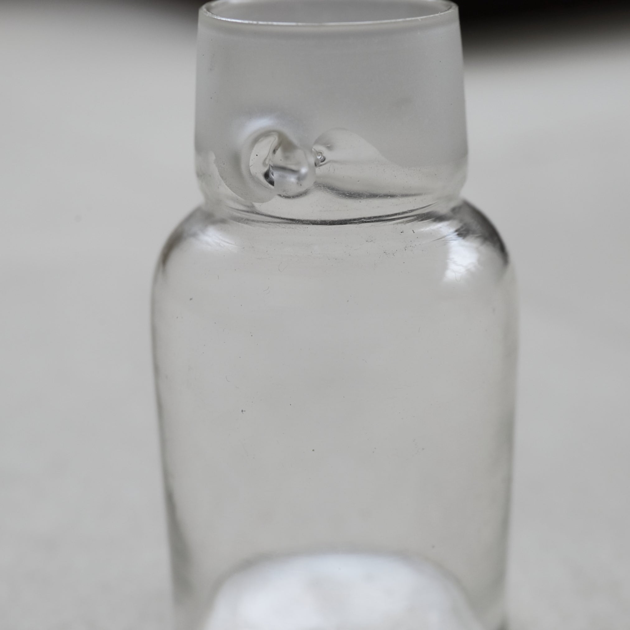 old glass tea container