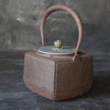 Old iron kettle with open lid