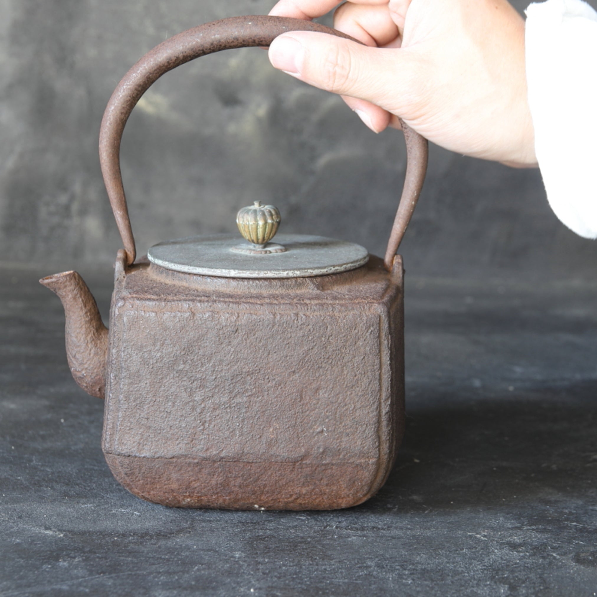 Old iron kettle with open lid