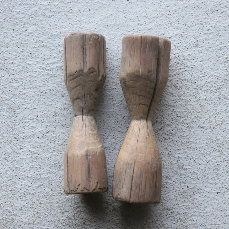 2 wooden weights
