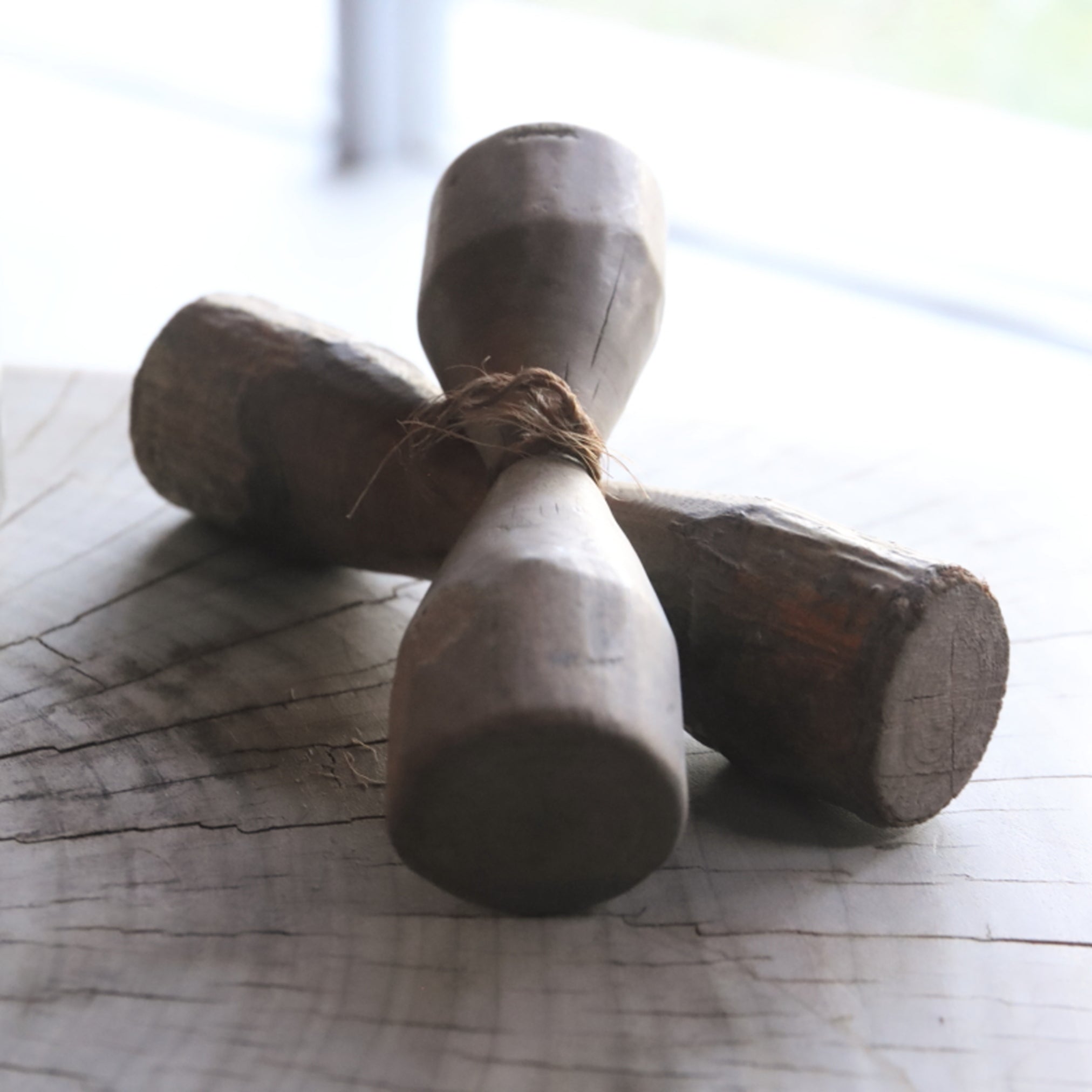 2 wooden weights