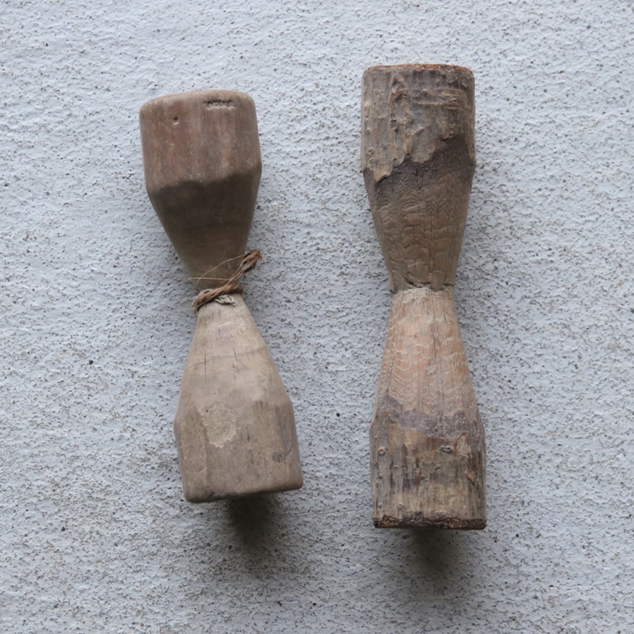 2 wooden weights