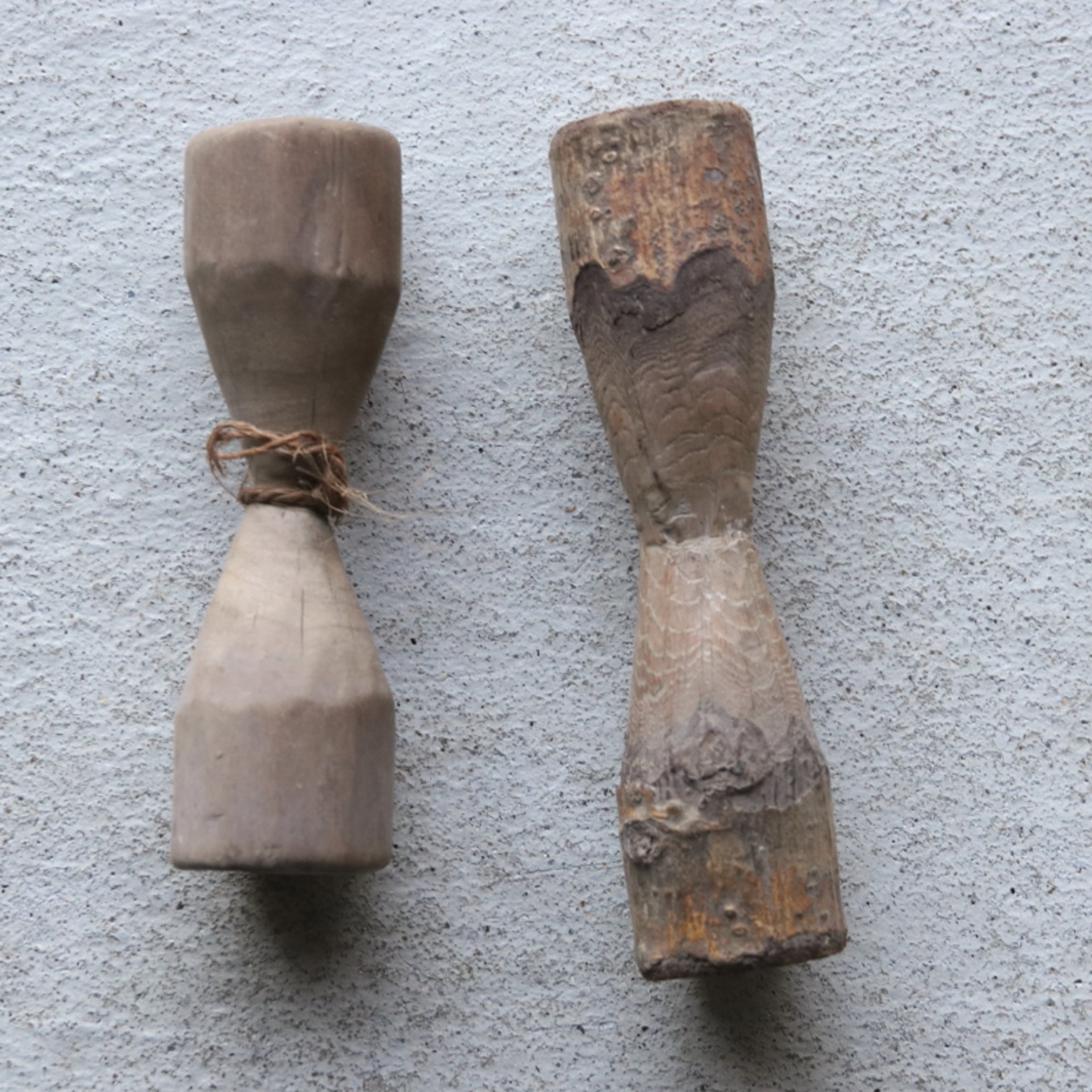 2 wooden weights