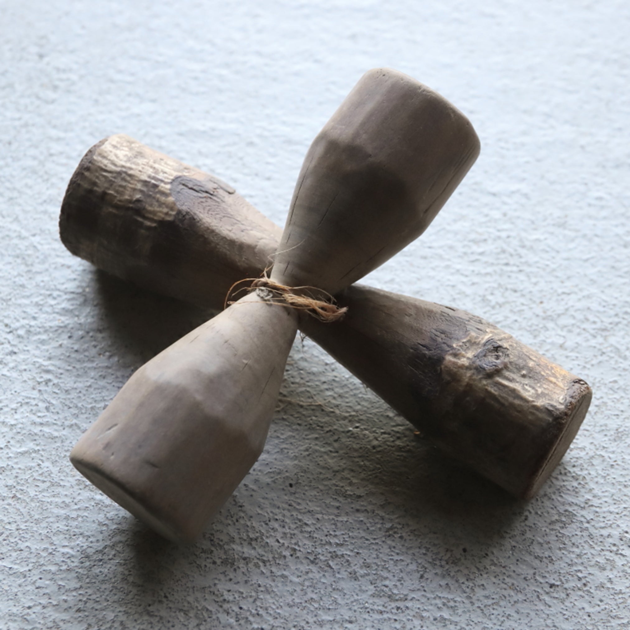 2 wooden weights