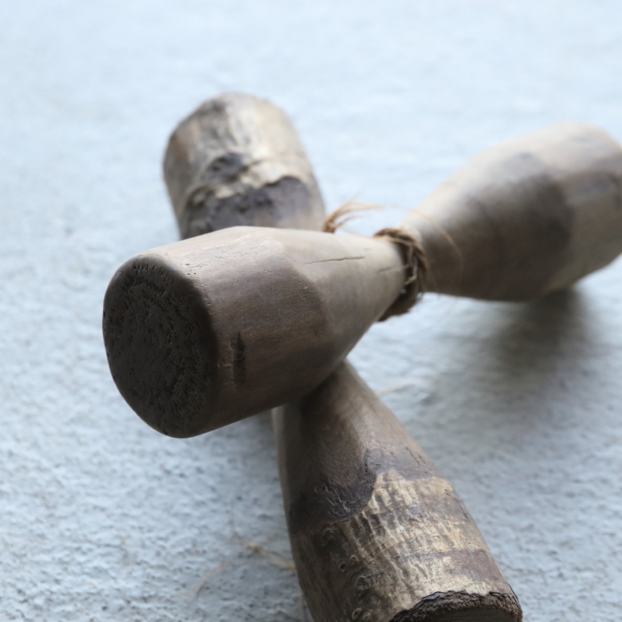 2 wooden weights