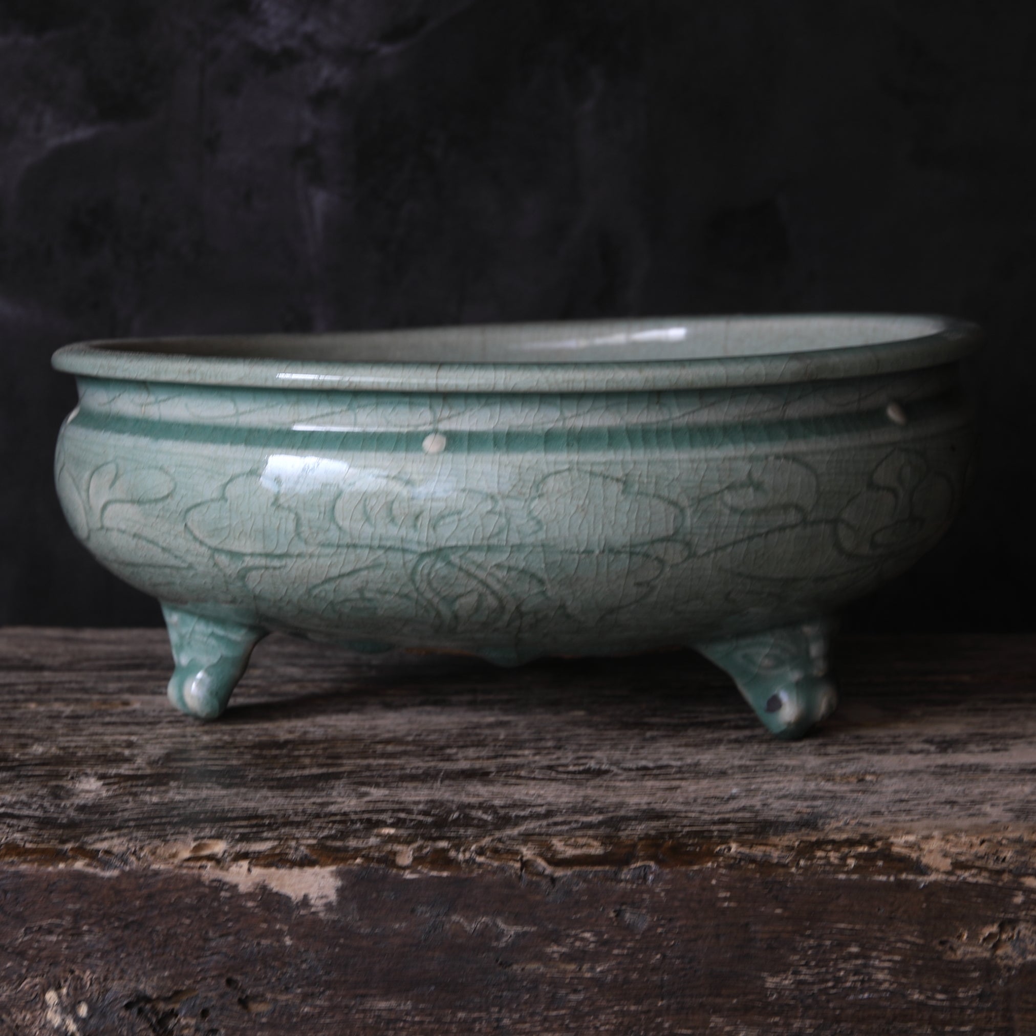 Celadon porcelain three-legged bowl with peony arabesque design Ming Dynasty/1368-1644CE